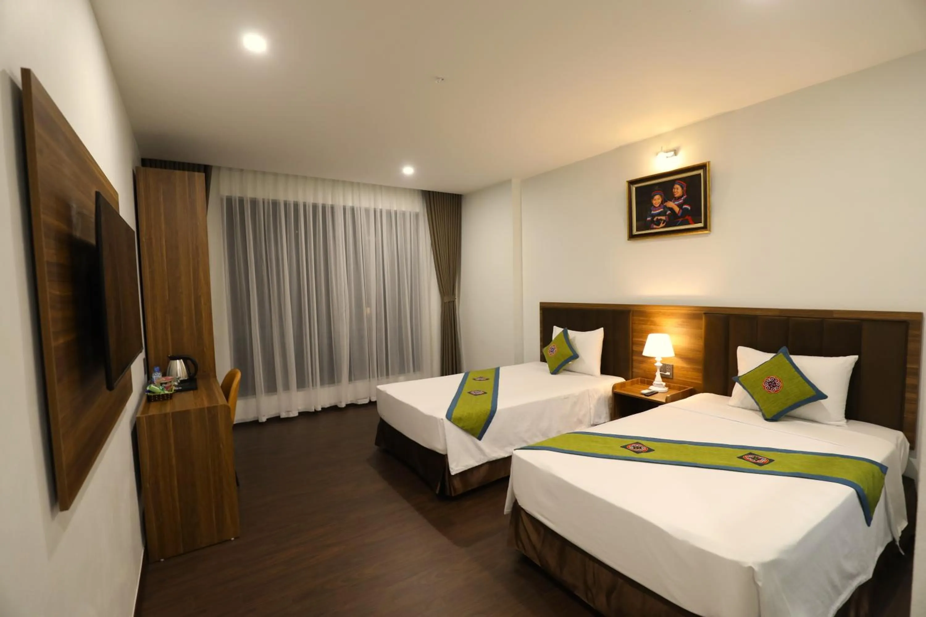 Bed in Lang Can Boutique Hotel