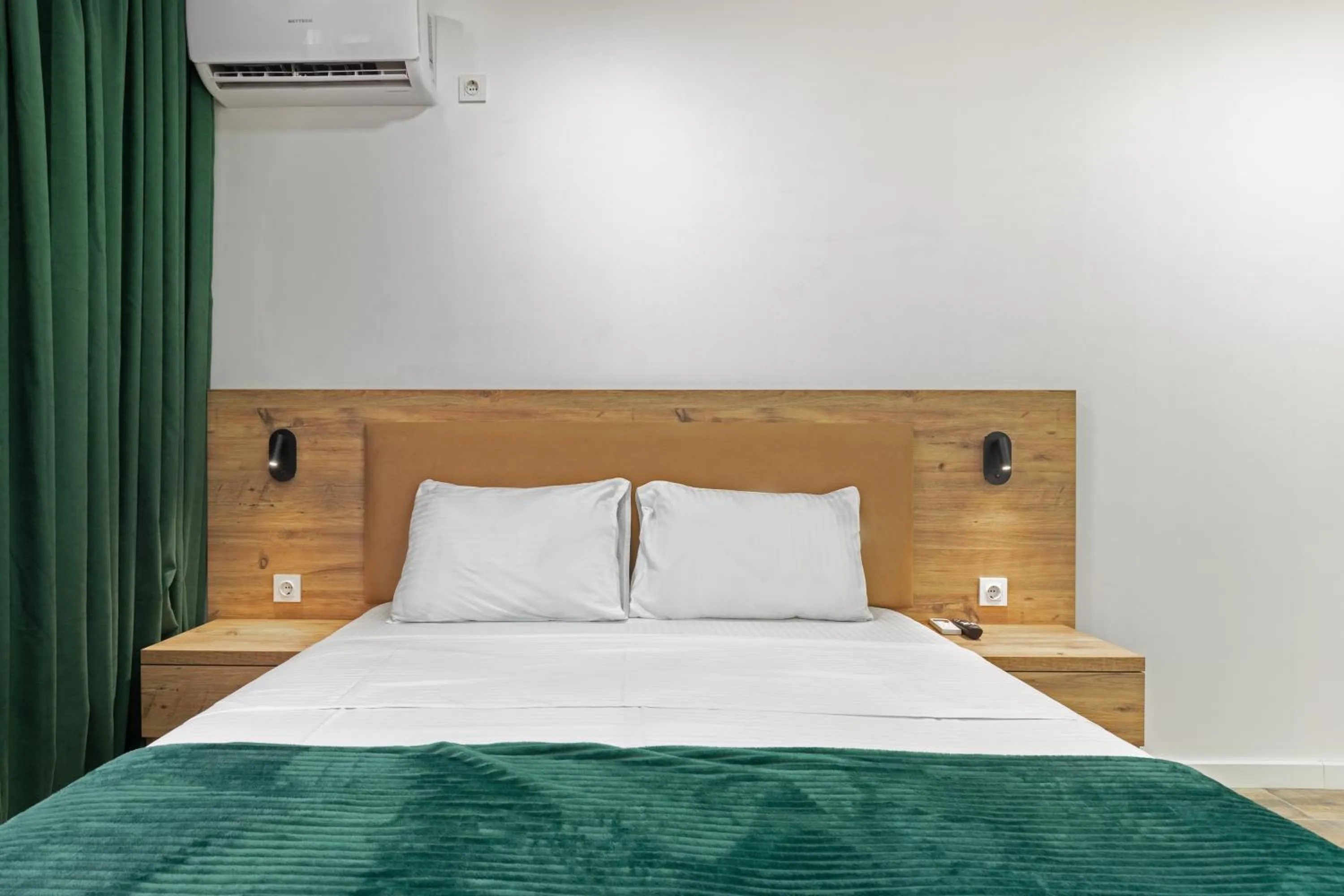 Bed in Sunshine Residence & Hotel