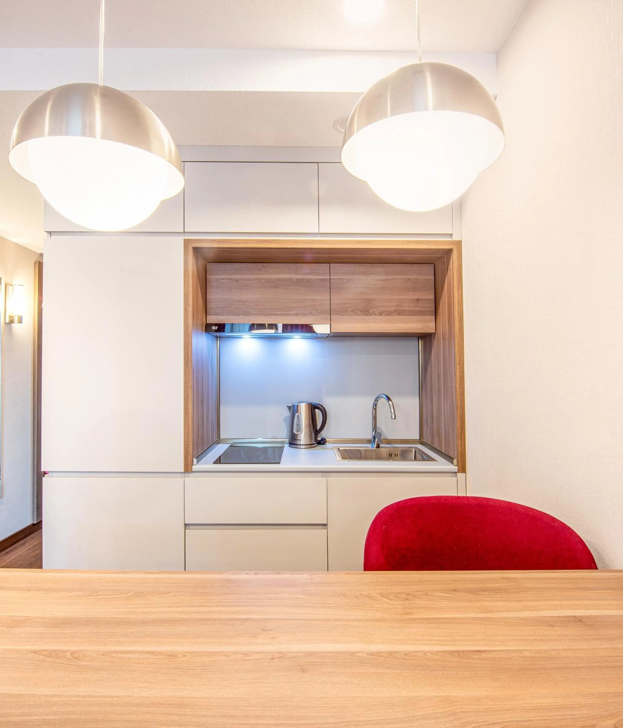 Kitchen or kitchenette in Sunshine Residence & Hotel