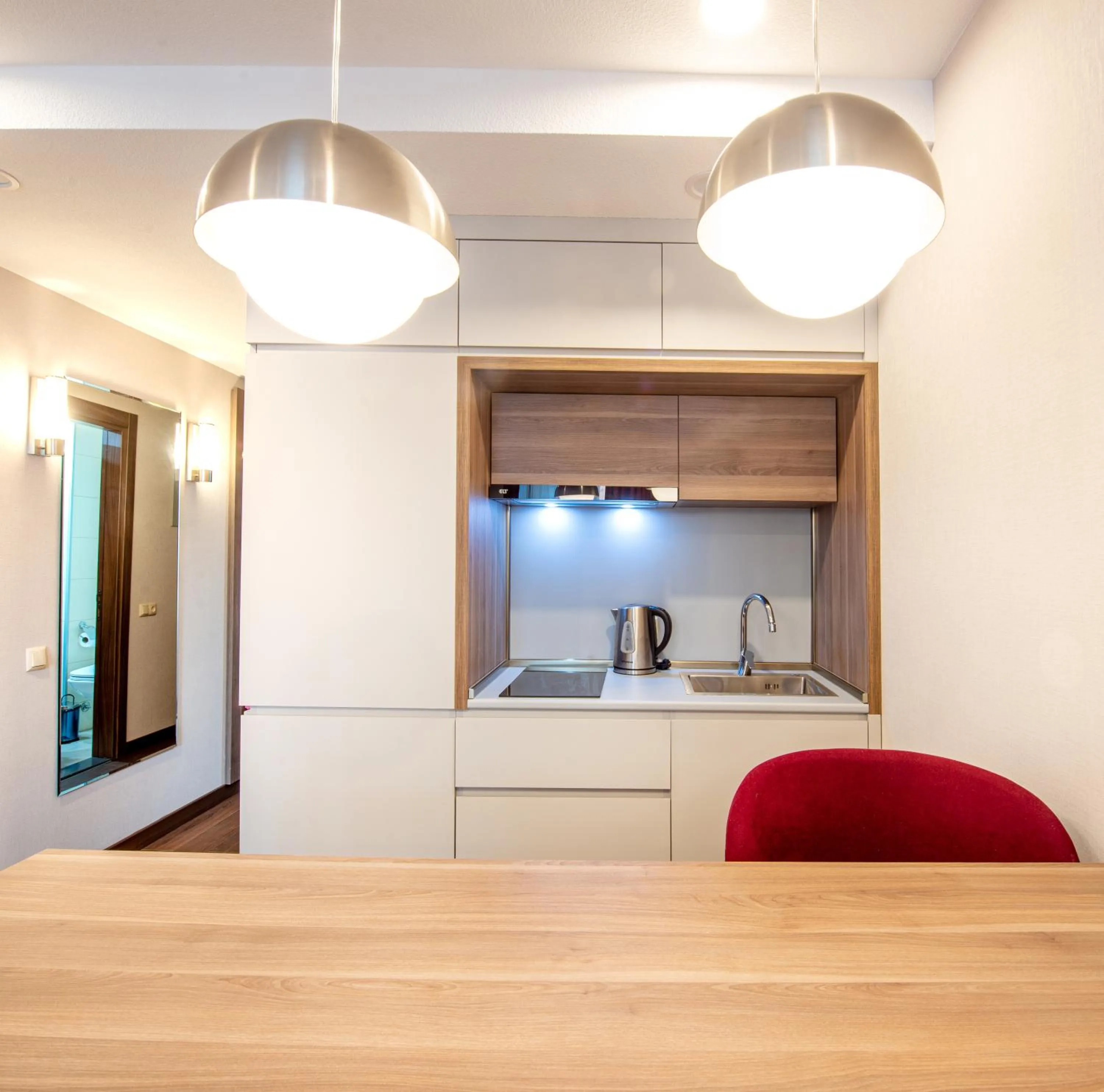 Kitchen or kitchenette in Sunshine Residence & Hotel