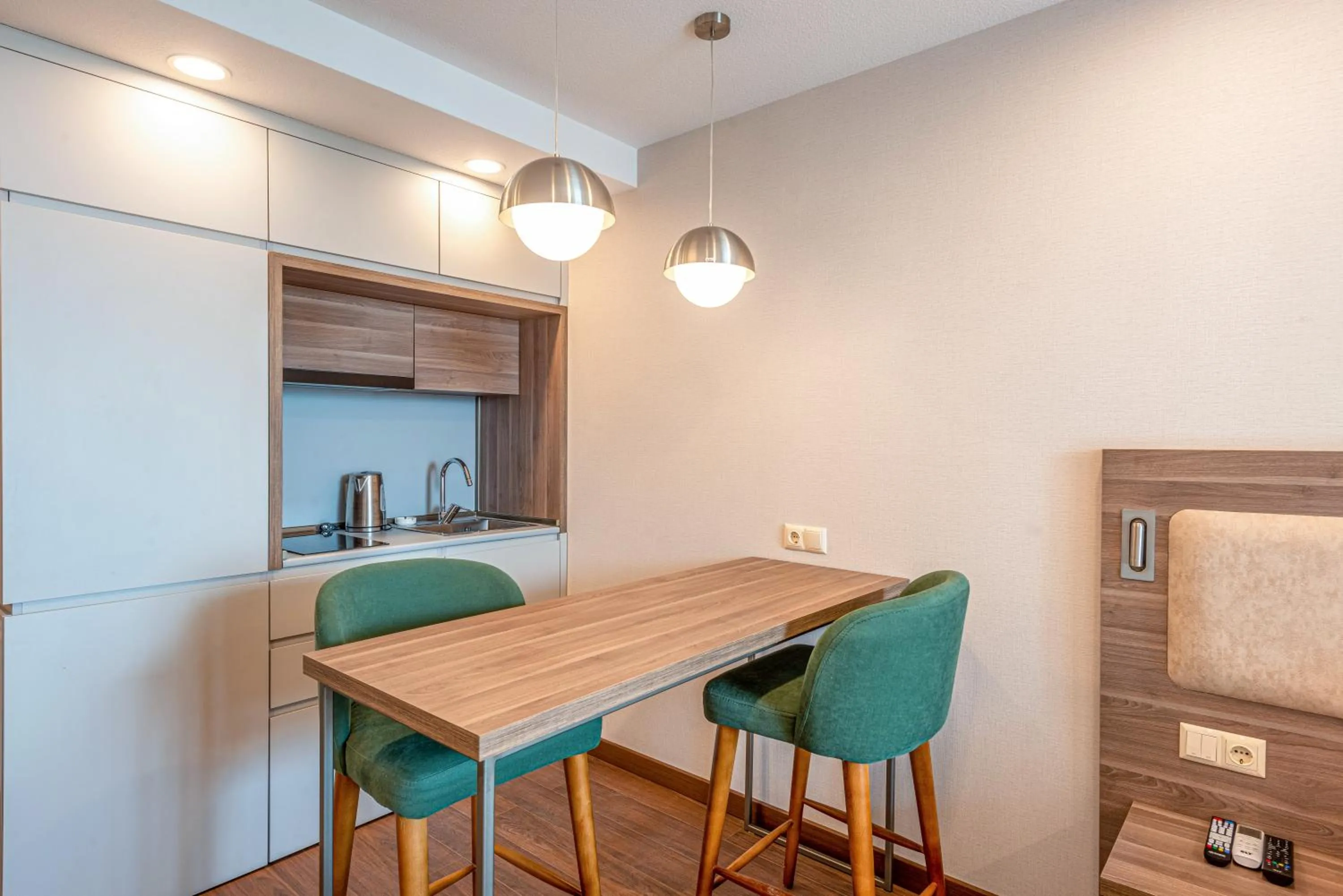 Kitchen or kitchenette in Sunshine Residence & Hotel