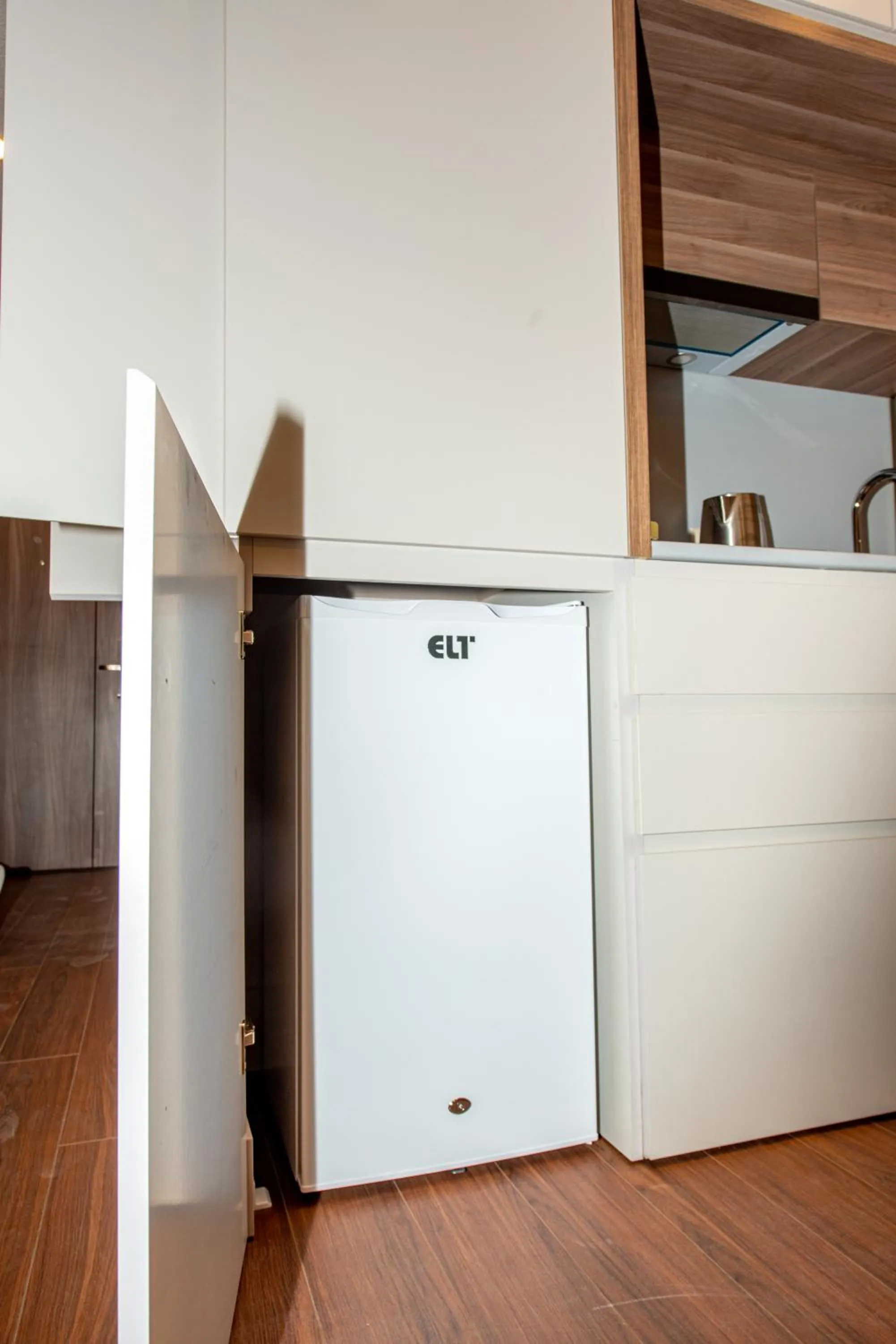 Kitchen or kitchenette in Sunshine Residence & Hotel