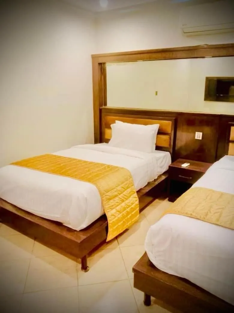Bed in Bling International Hotel Multan