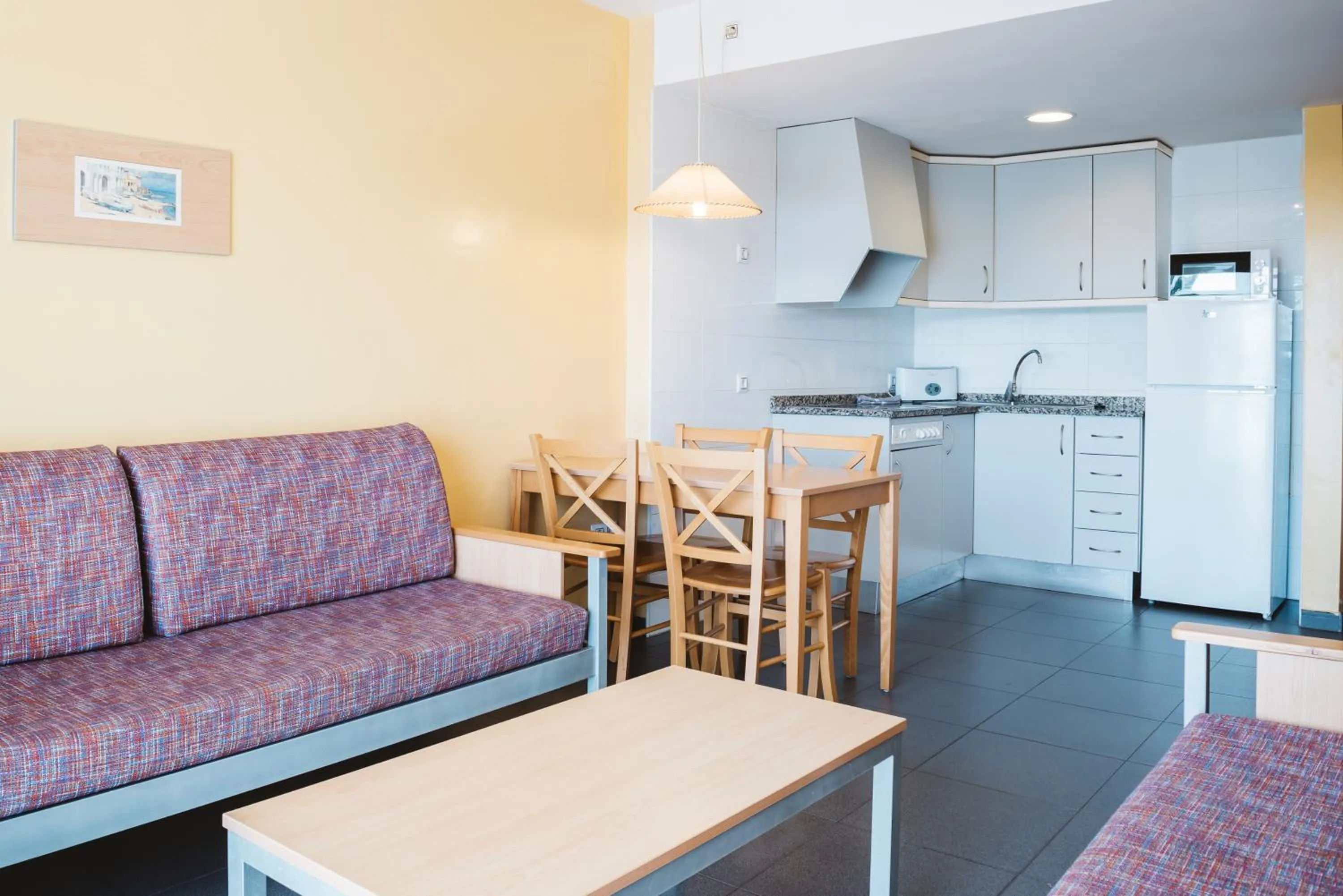 Kitchen or kitchenette in Apartamentos Turisticos Terralta