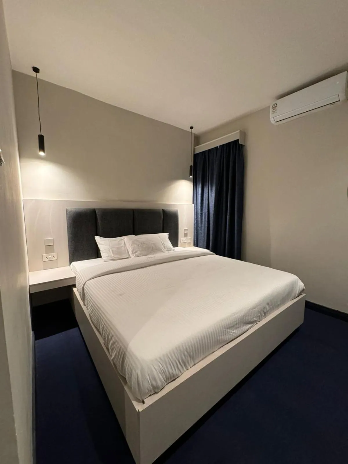 Bed in The Ivory Hotel