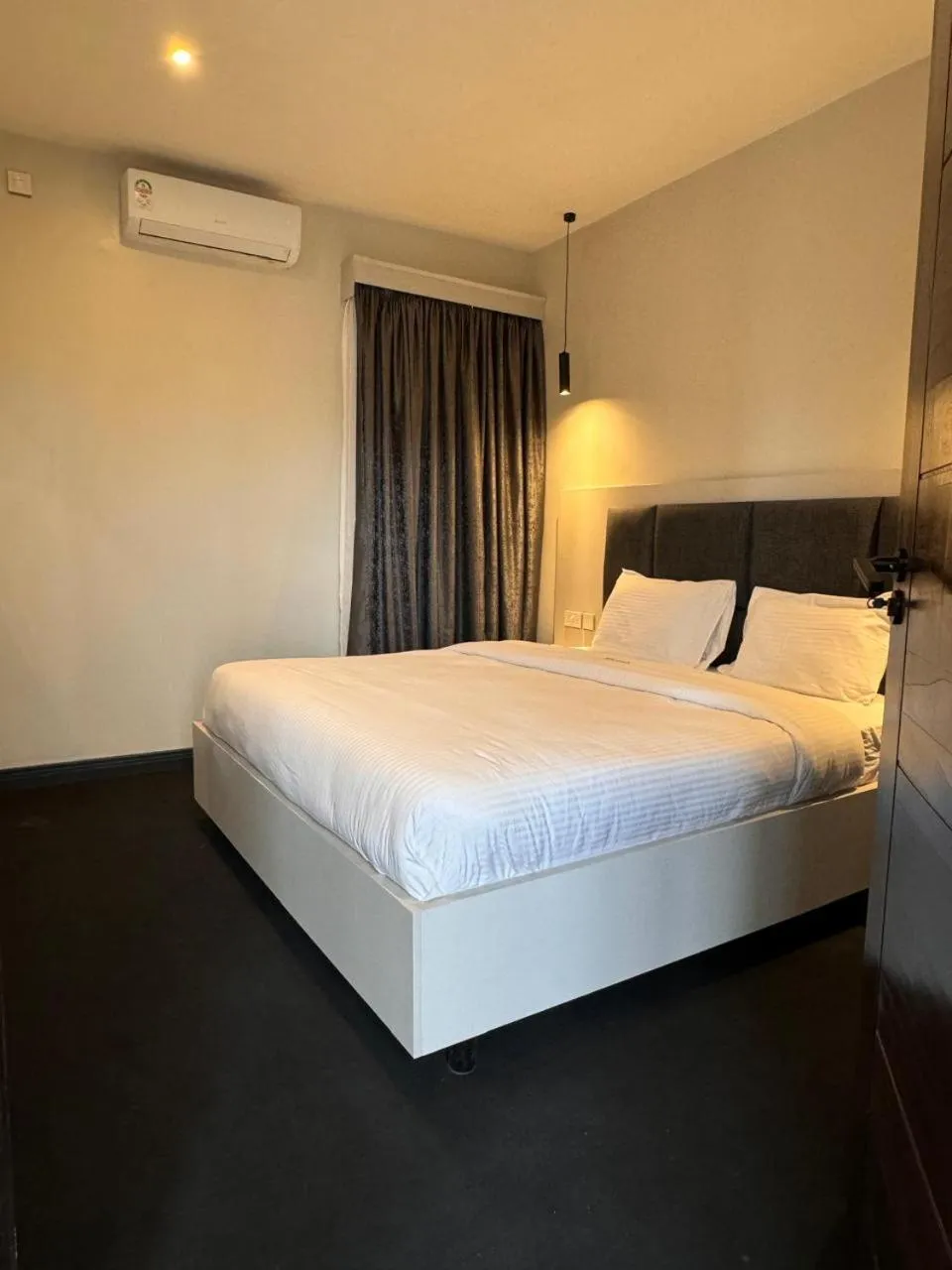 Bed in The Ivory Hotel