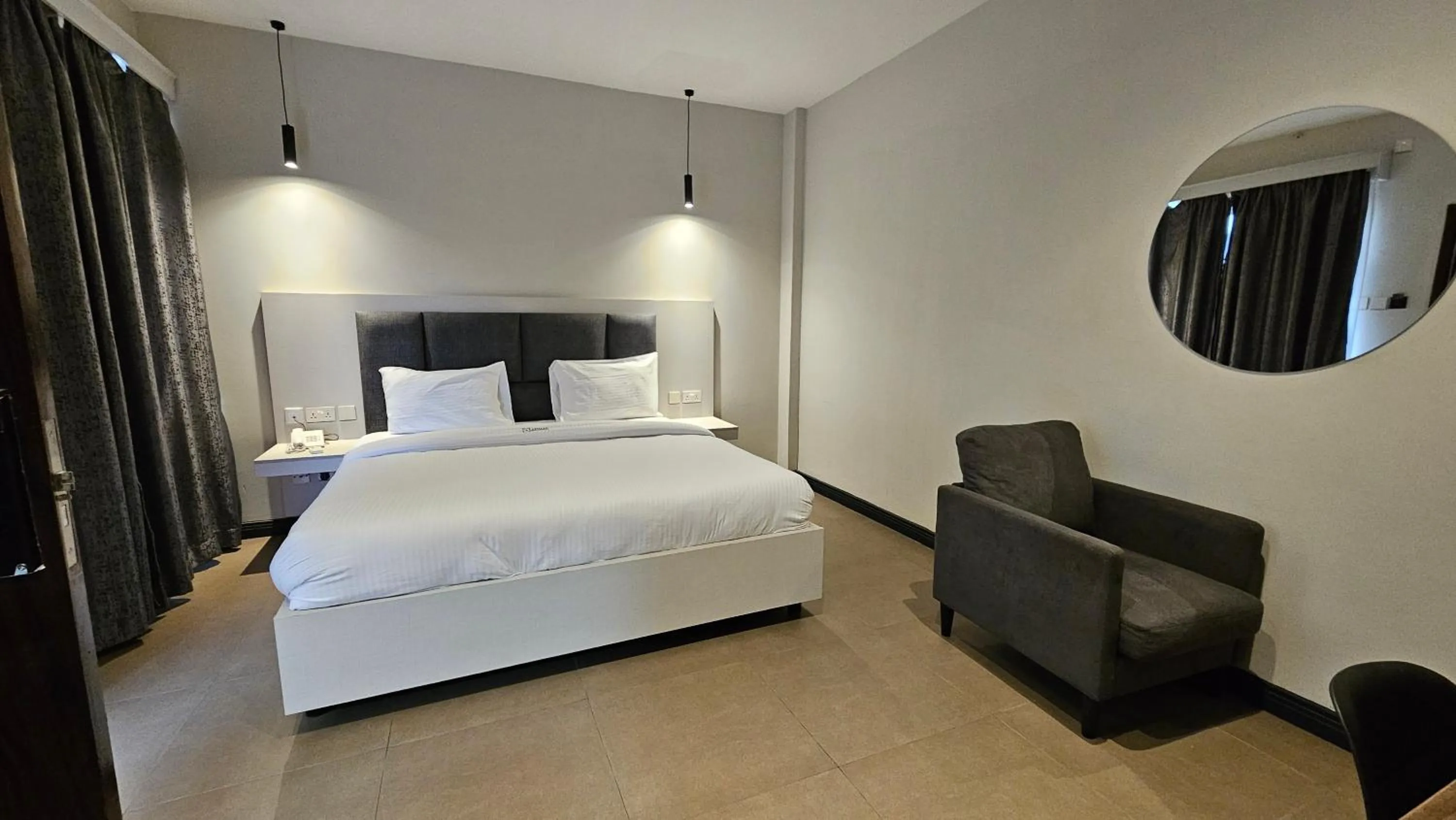 Bed in The Ivory Hotel