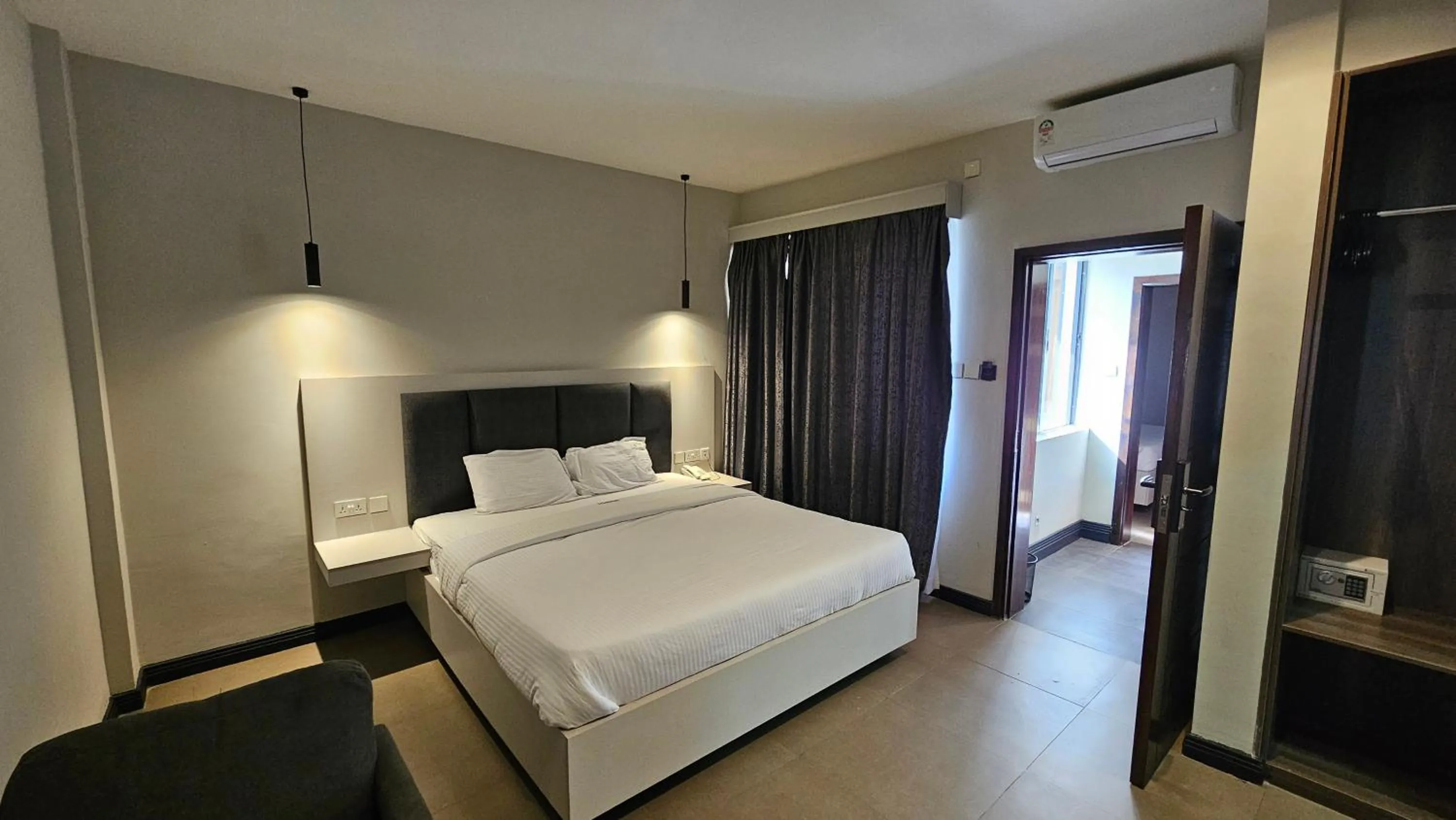 Bed in The Ivory Hotel