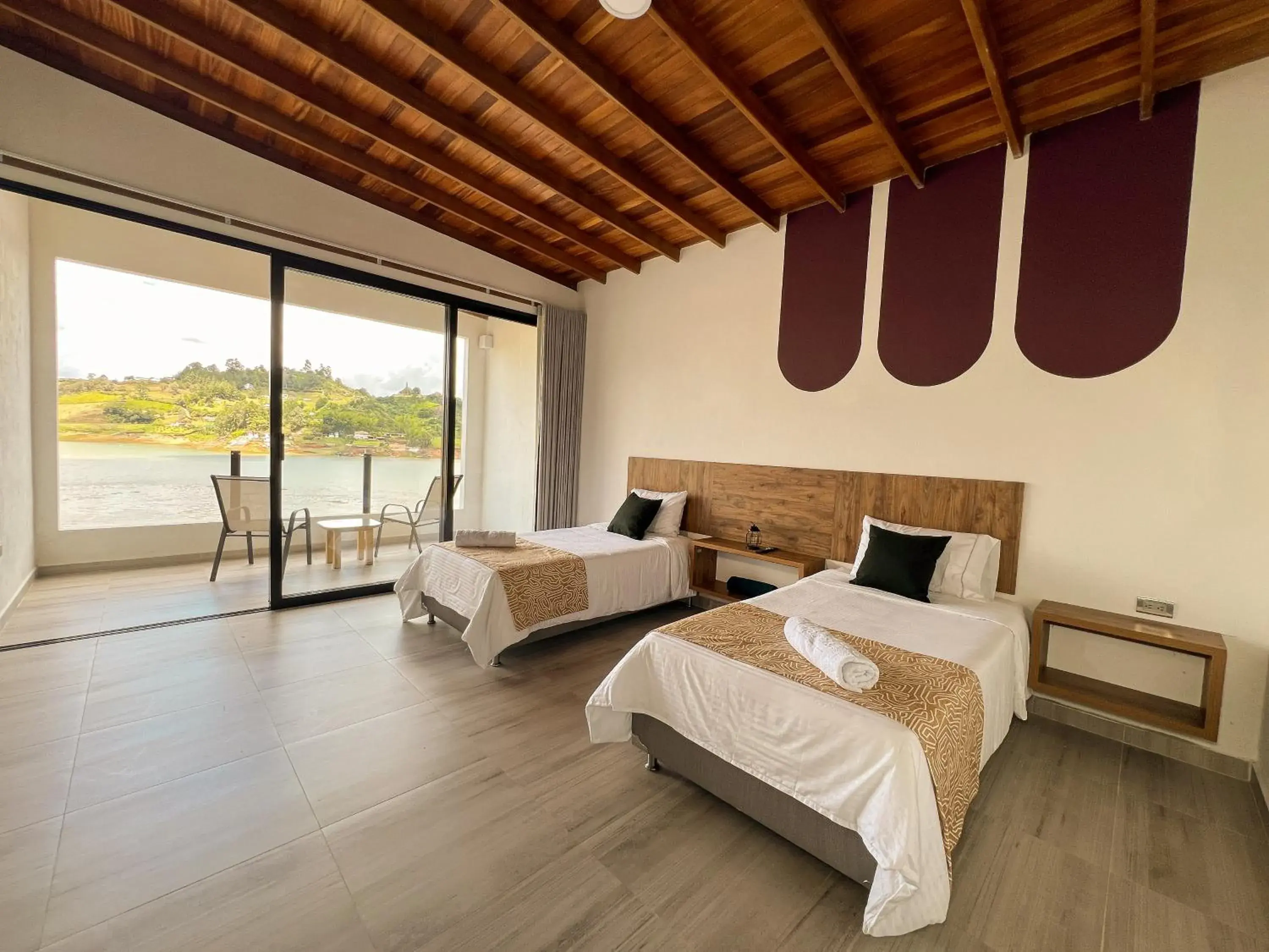 Deluxe Quadruple Room in Viajero Guatapé Hostel & Lake Club Deluxe Quadruple Room in Viajero Guatapé Hostel & Lake Club