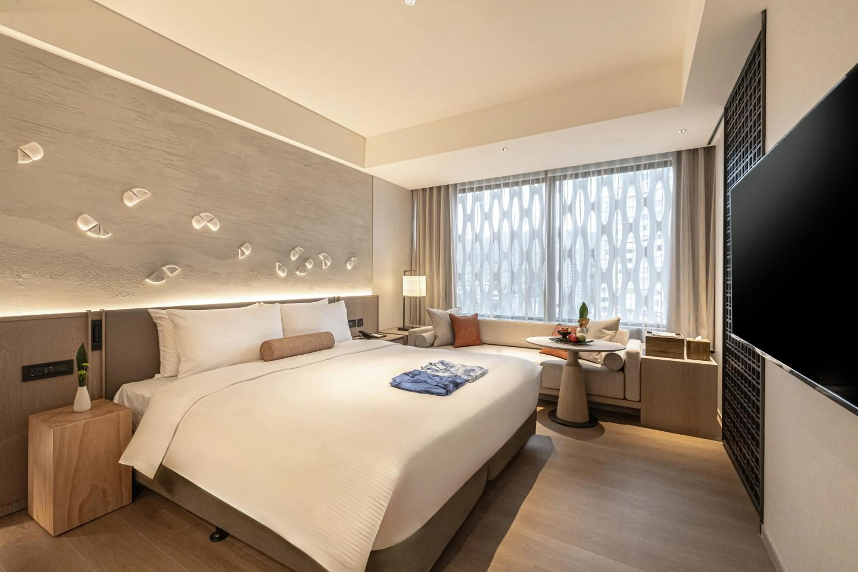 Bed in 北投晶泉丰旅 Wellspring by Silks Beitou