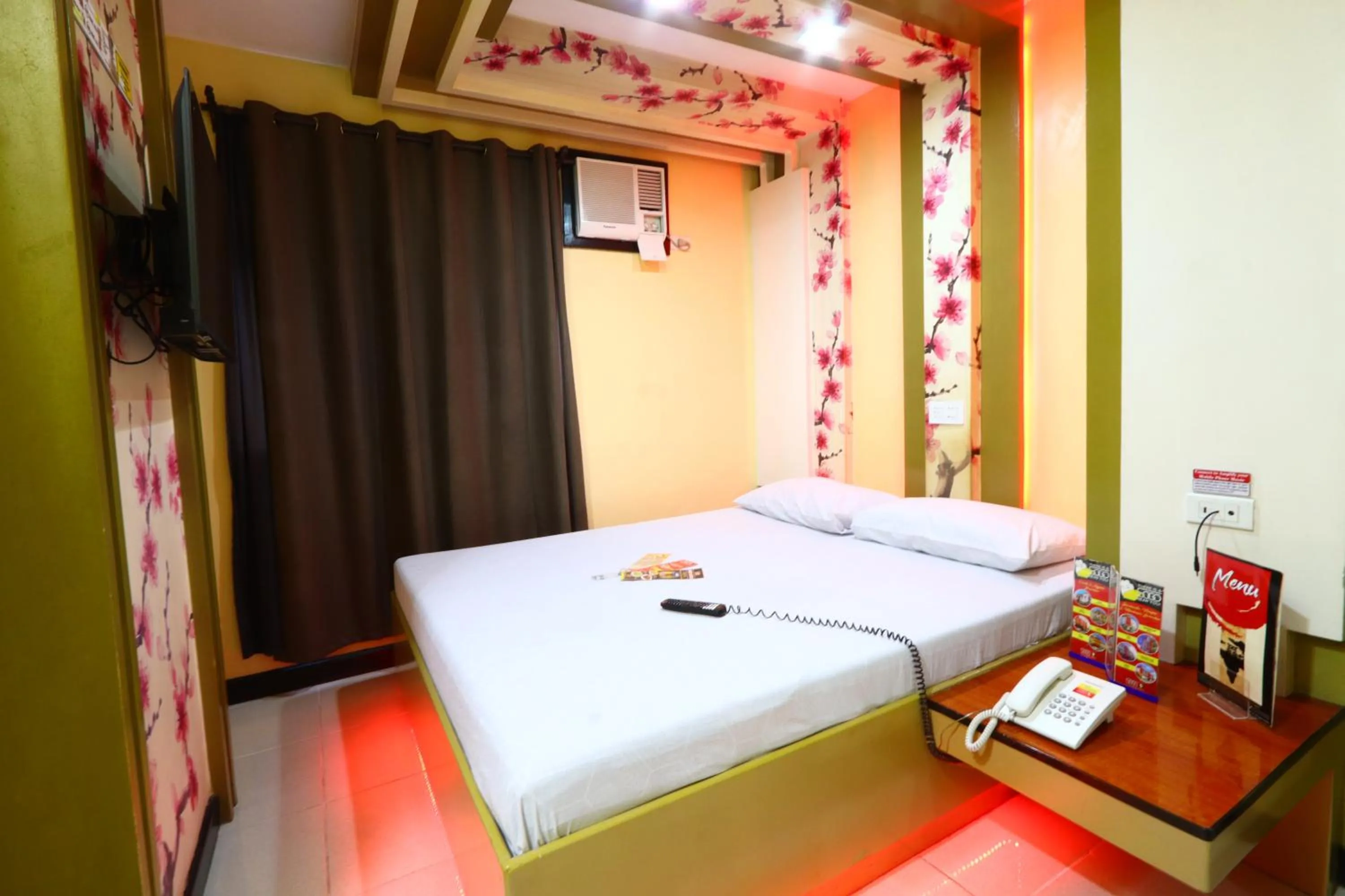 Bedroom, Bed in Hotel Sogo Yabut