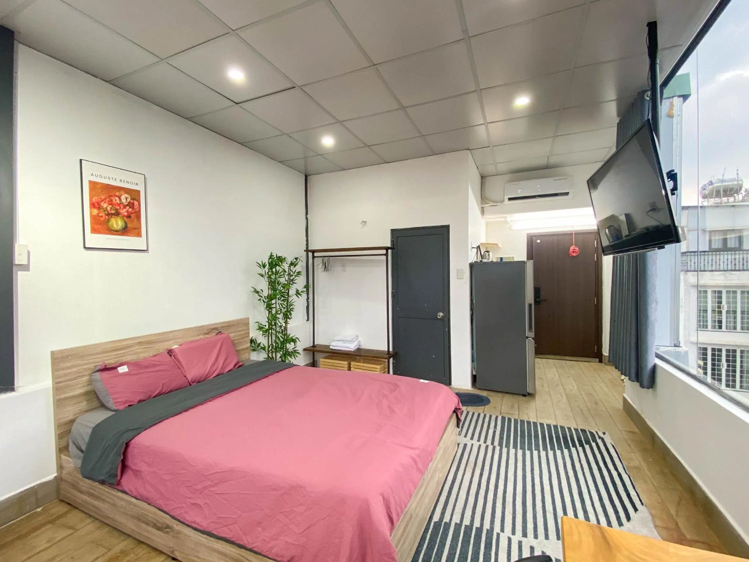 Communal lounge/ TV room, Bed in Zeus Living - Cozy Apartment in Thao Dien
