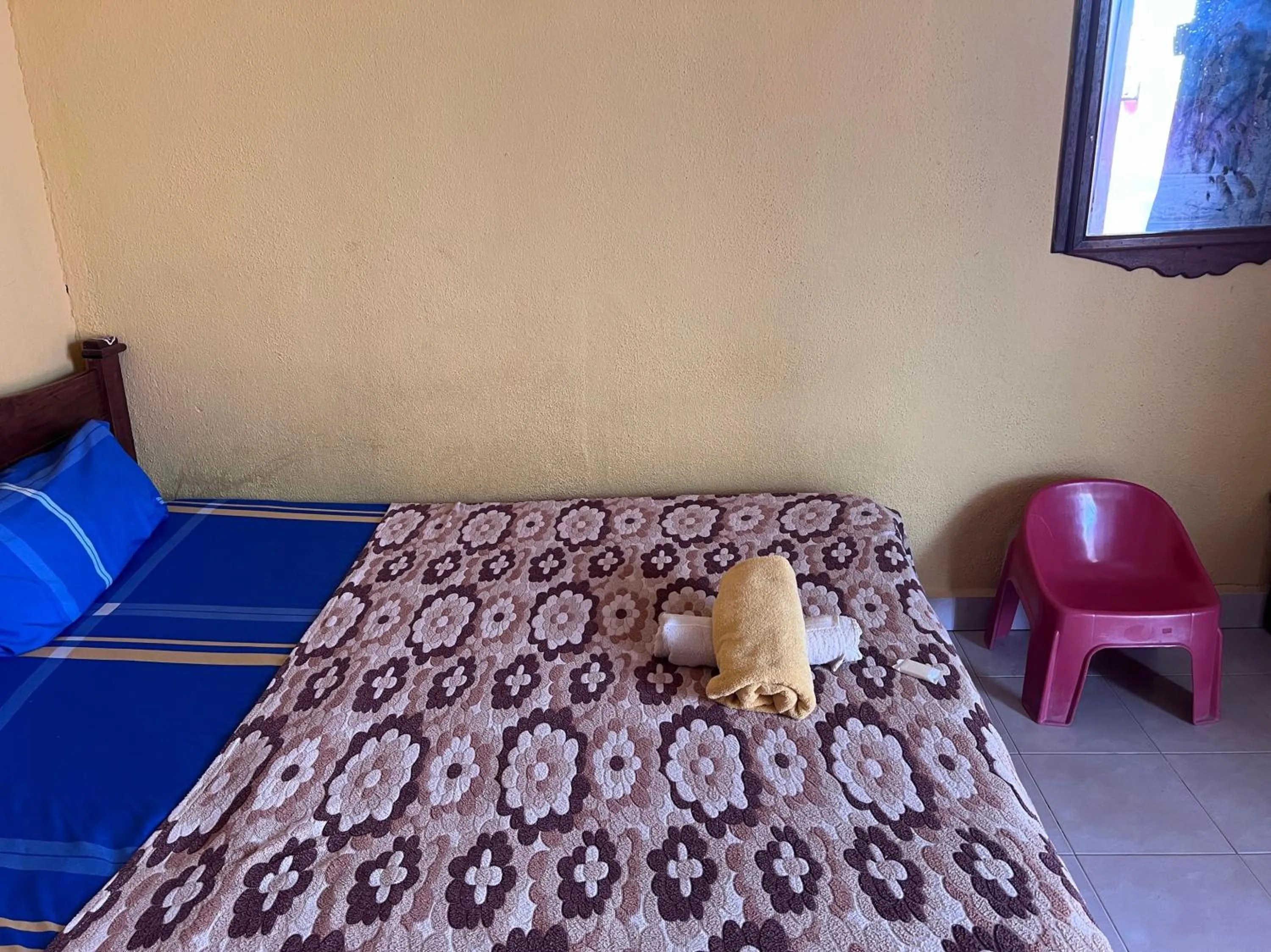 Bedroom in OYO 90981 Chenang Rest House 1