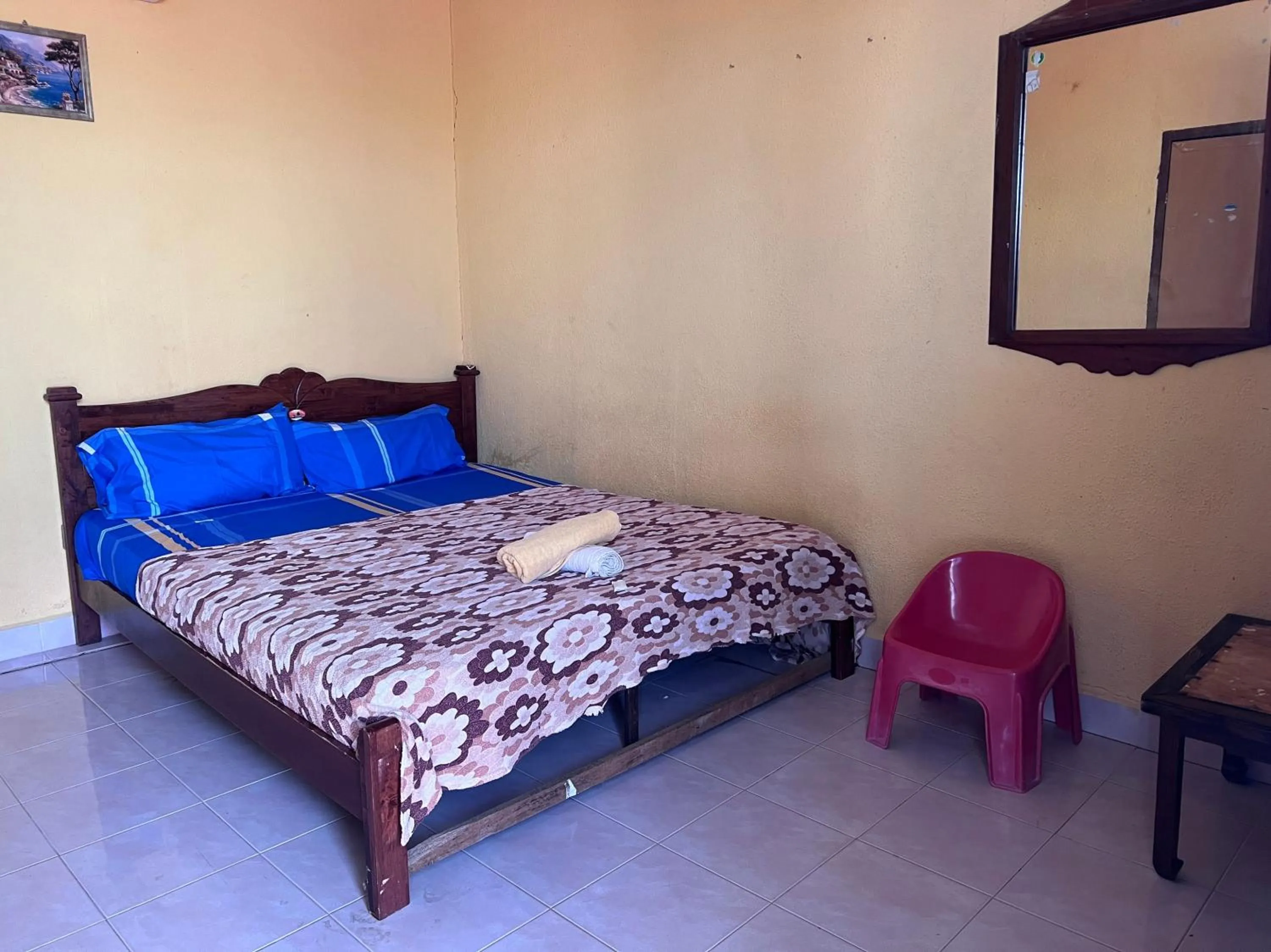 Bedroom in OYO 90981 Chenang Rest House 1