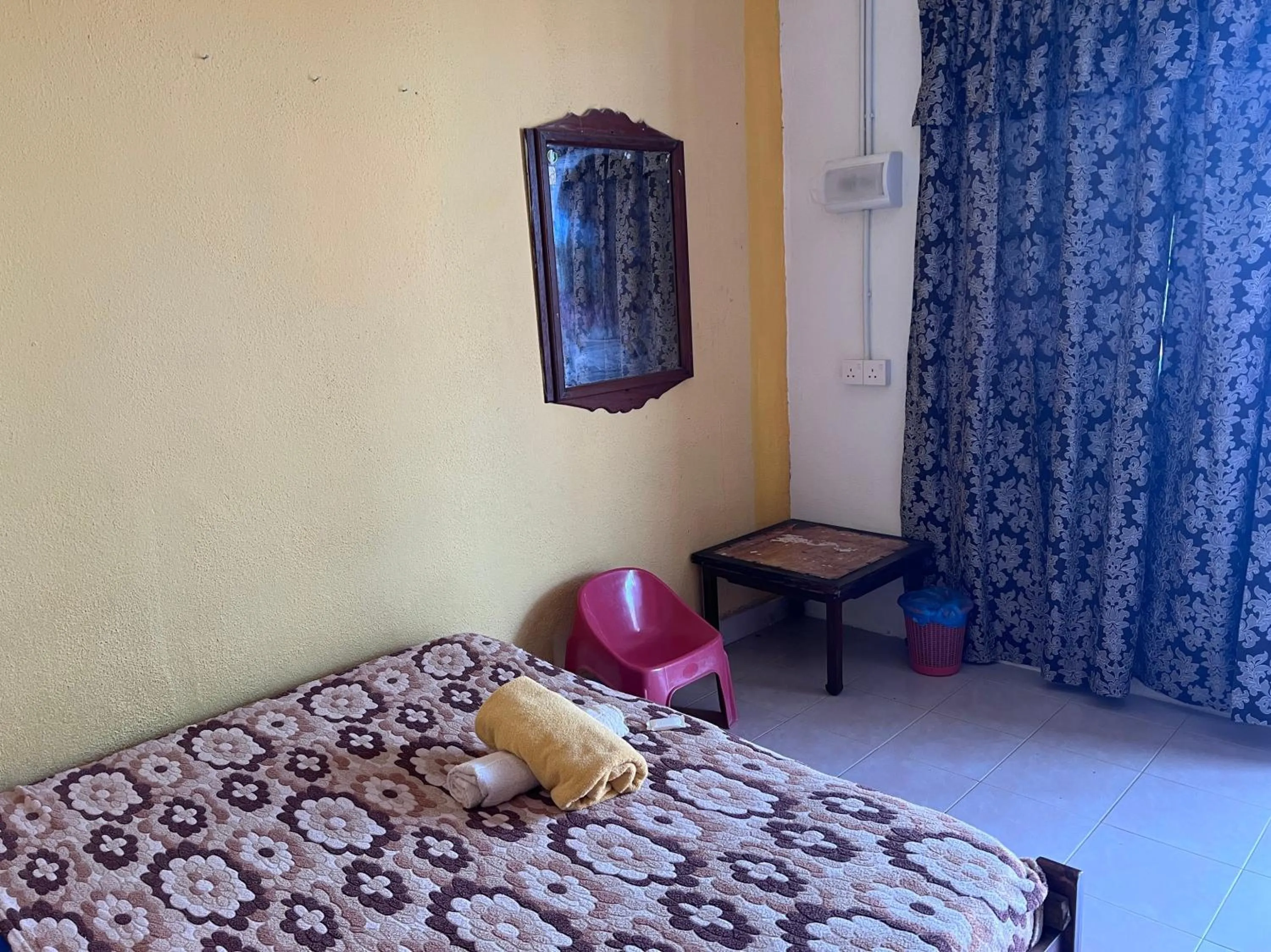 Bedroom in OYO 90981 Chenang Rest House 1