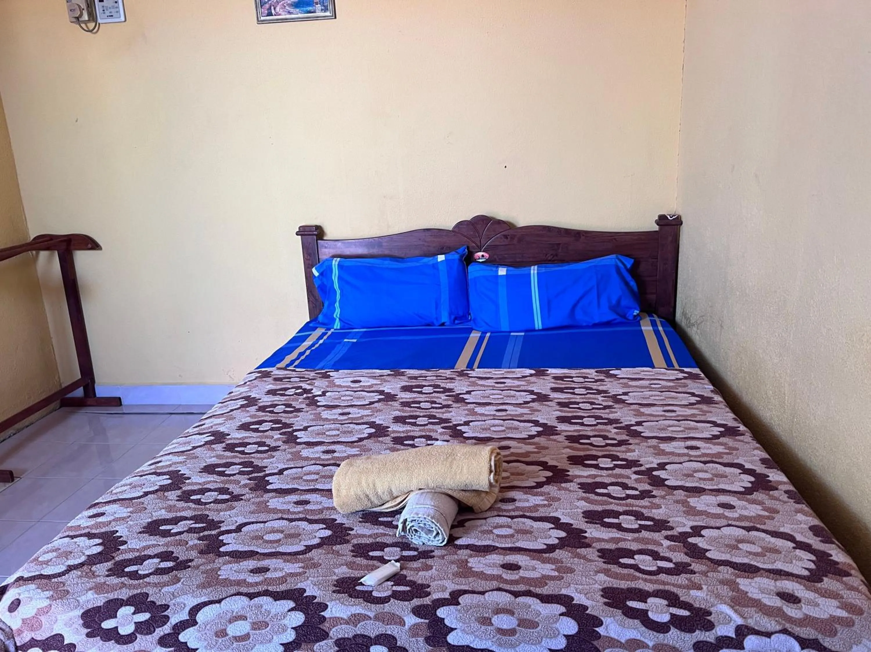 Bedroom in OYO 90981 Chenang Rest House 1