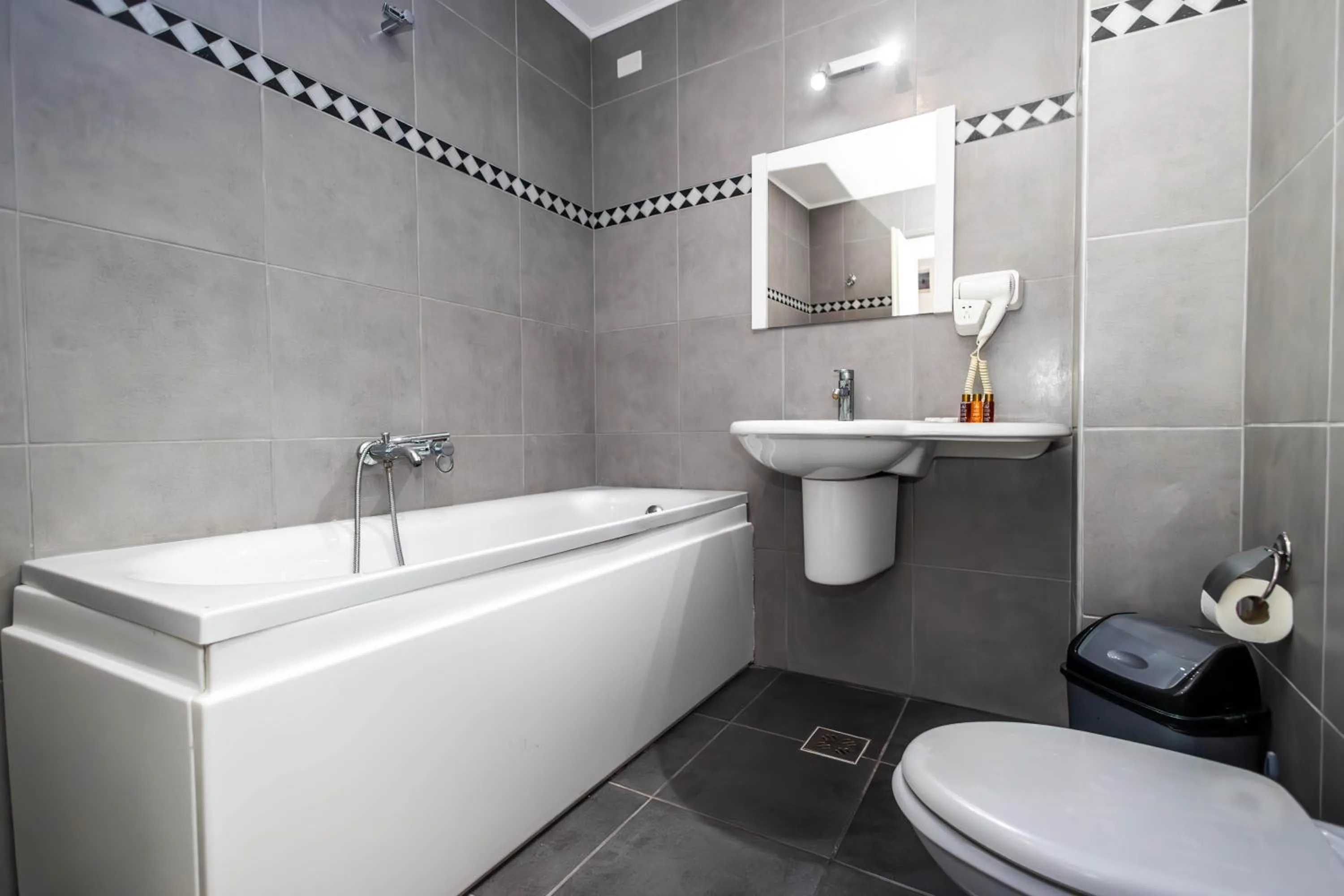 Toilet in OBA LUXURY BOUTIQUE