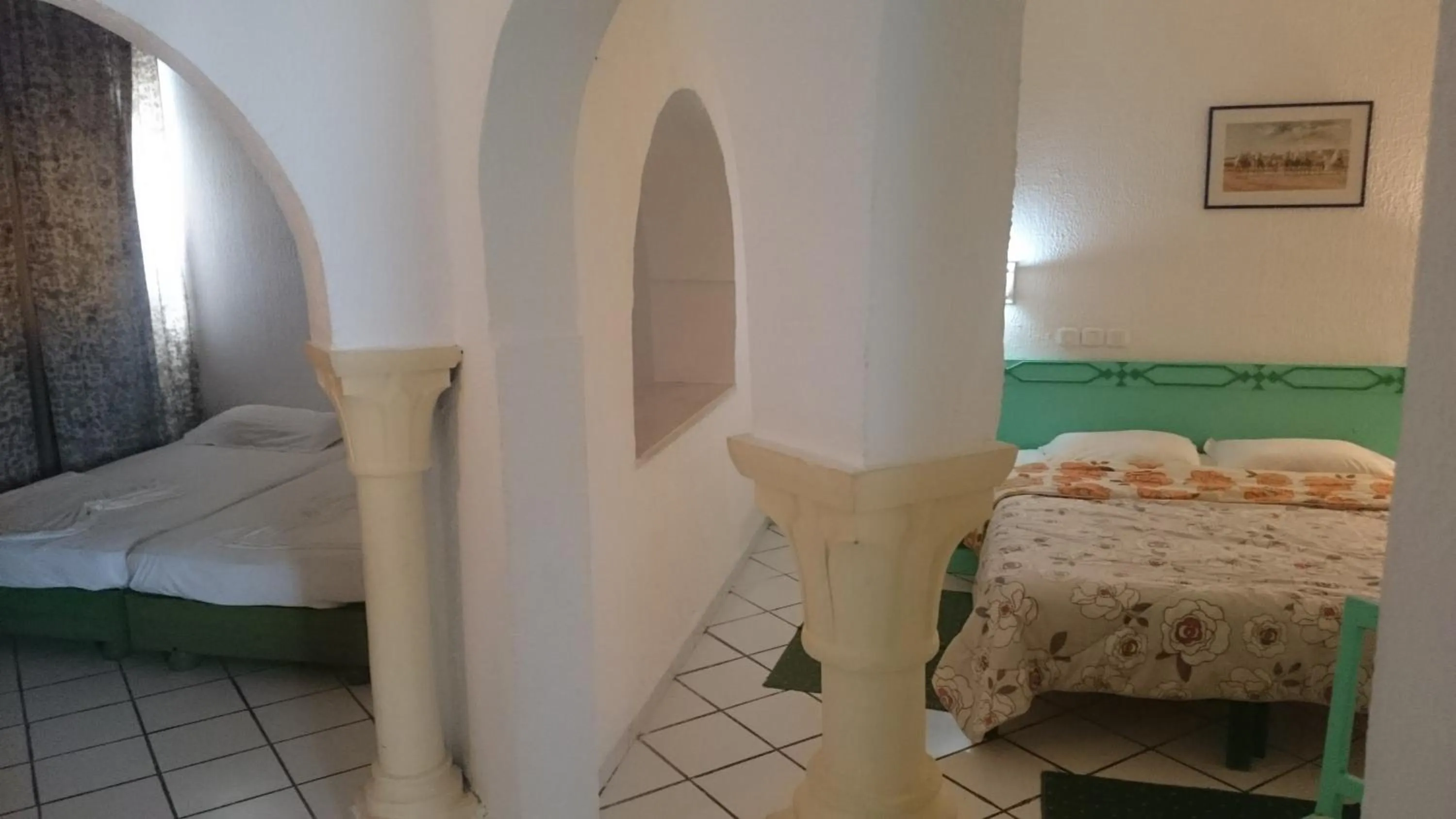 Bed in Hotel Le Khalife