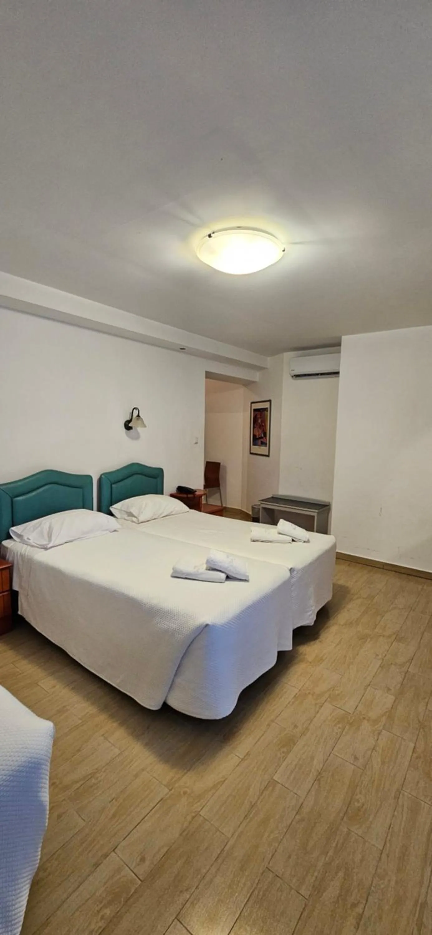 Bedroom in Olympic Village Hotel & SPA