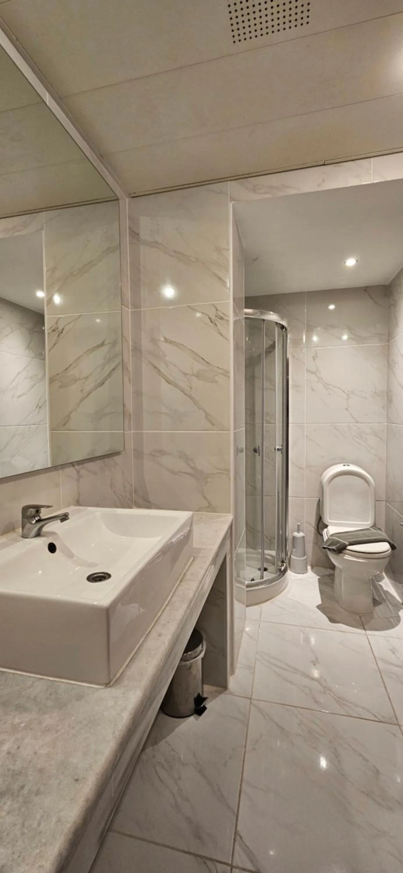 Bathroom in Olympic Village Hotel & SPA