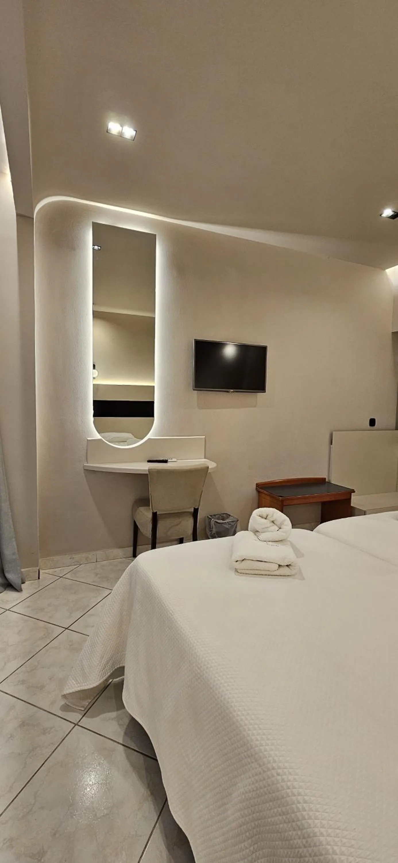 Bedroom in Olympic Village Hotel & SPA