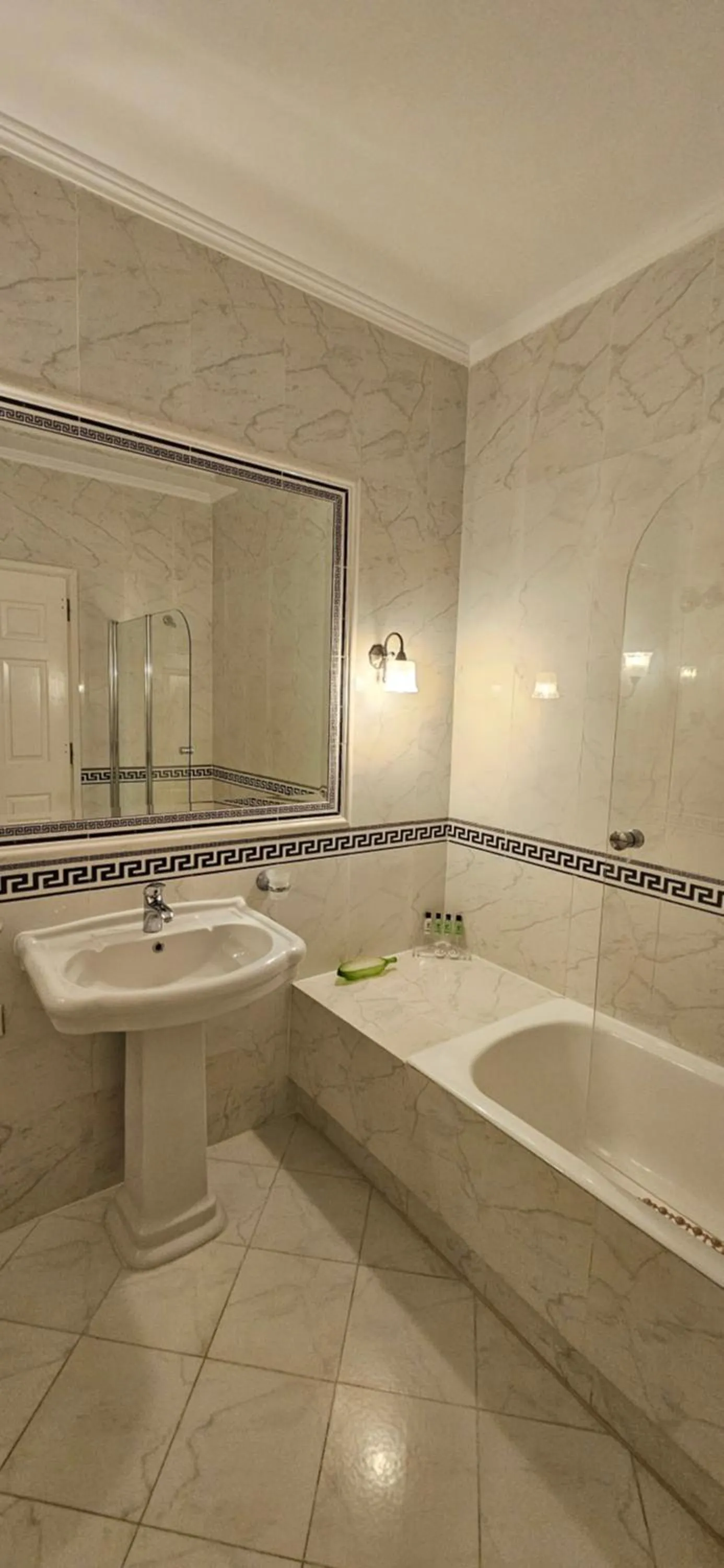 Bathroom in Olympic Village Hotel & SPA