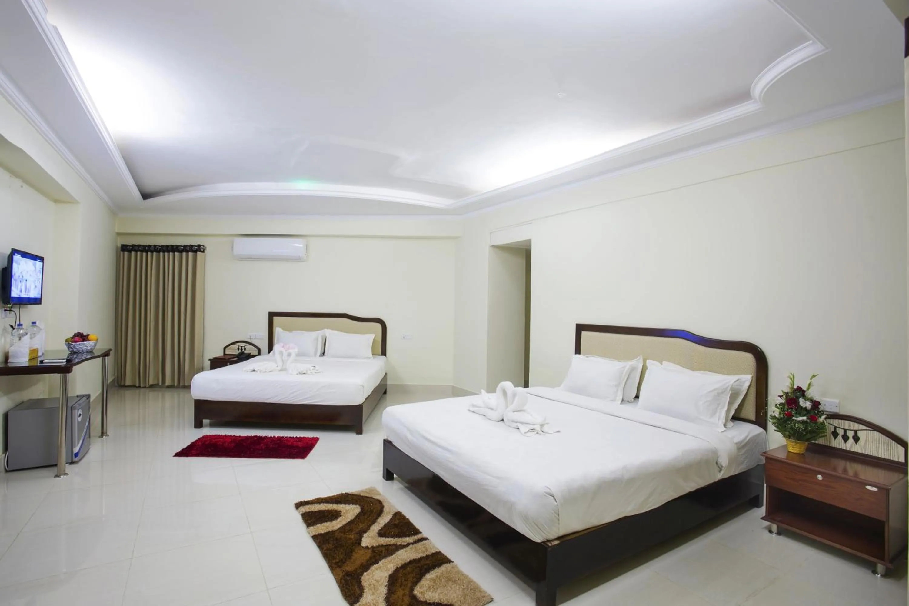 Bed in Panshi Inn Sylhet