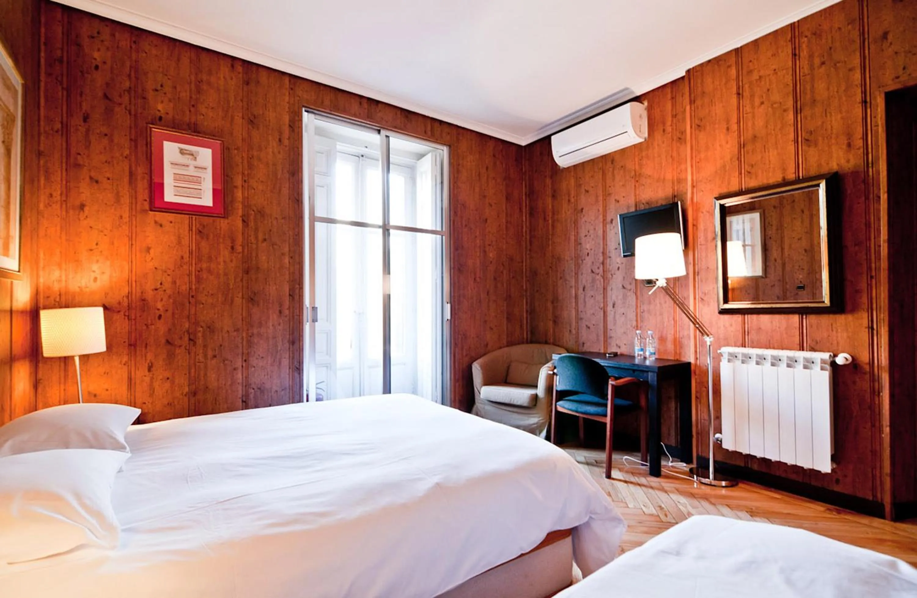 Photo of the whole room, Bed in Hostal Asunción