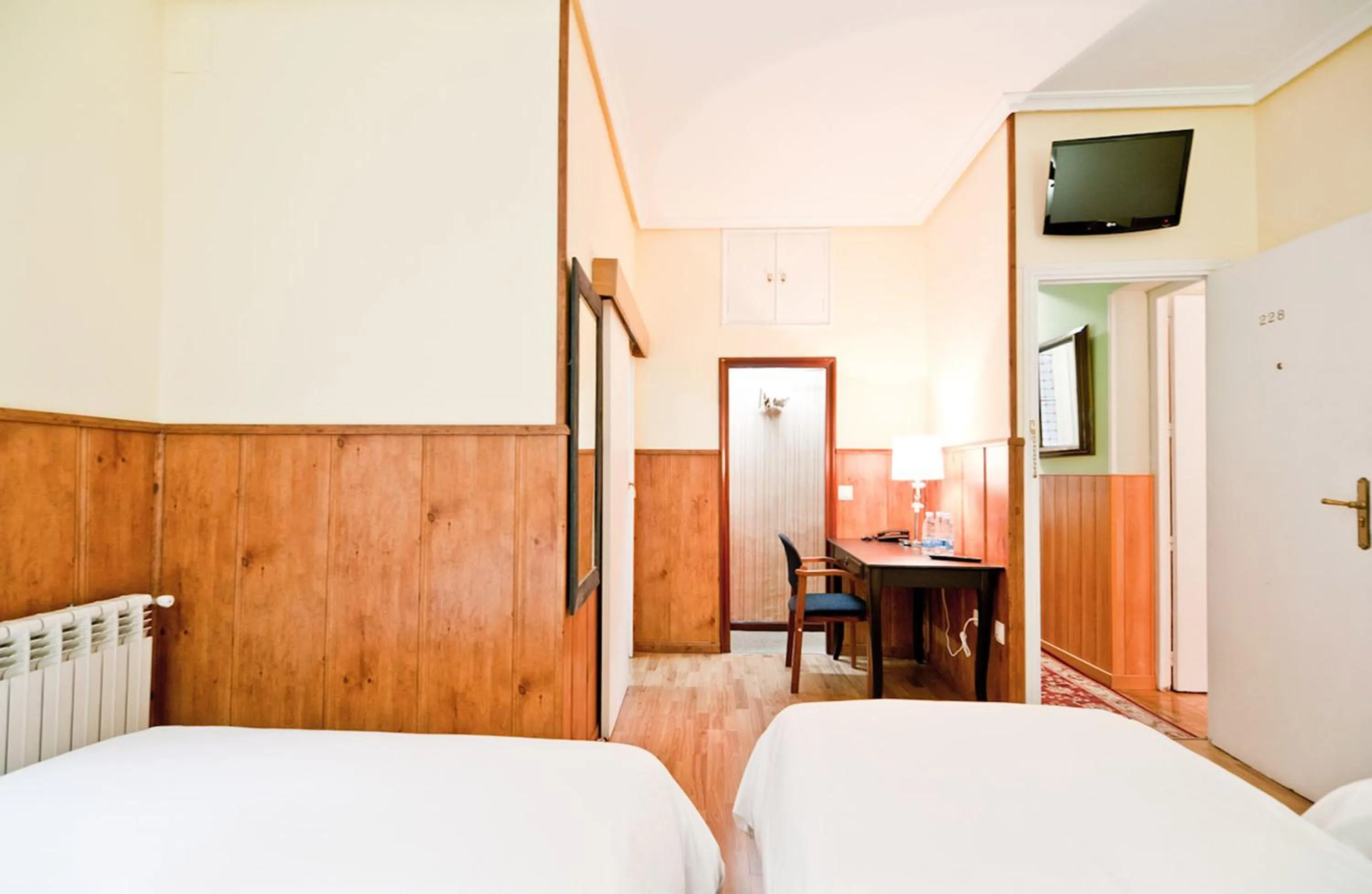 Photo of the whole room, Bed in Hostal Asunción