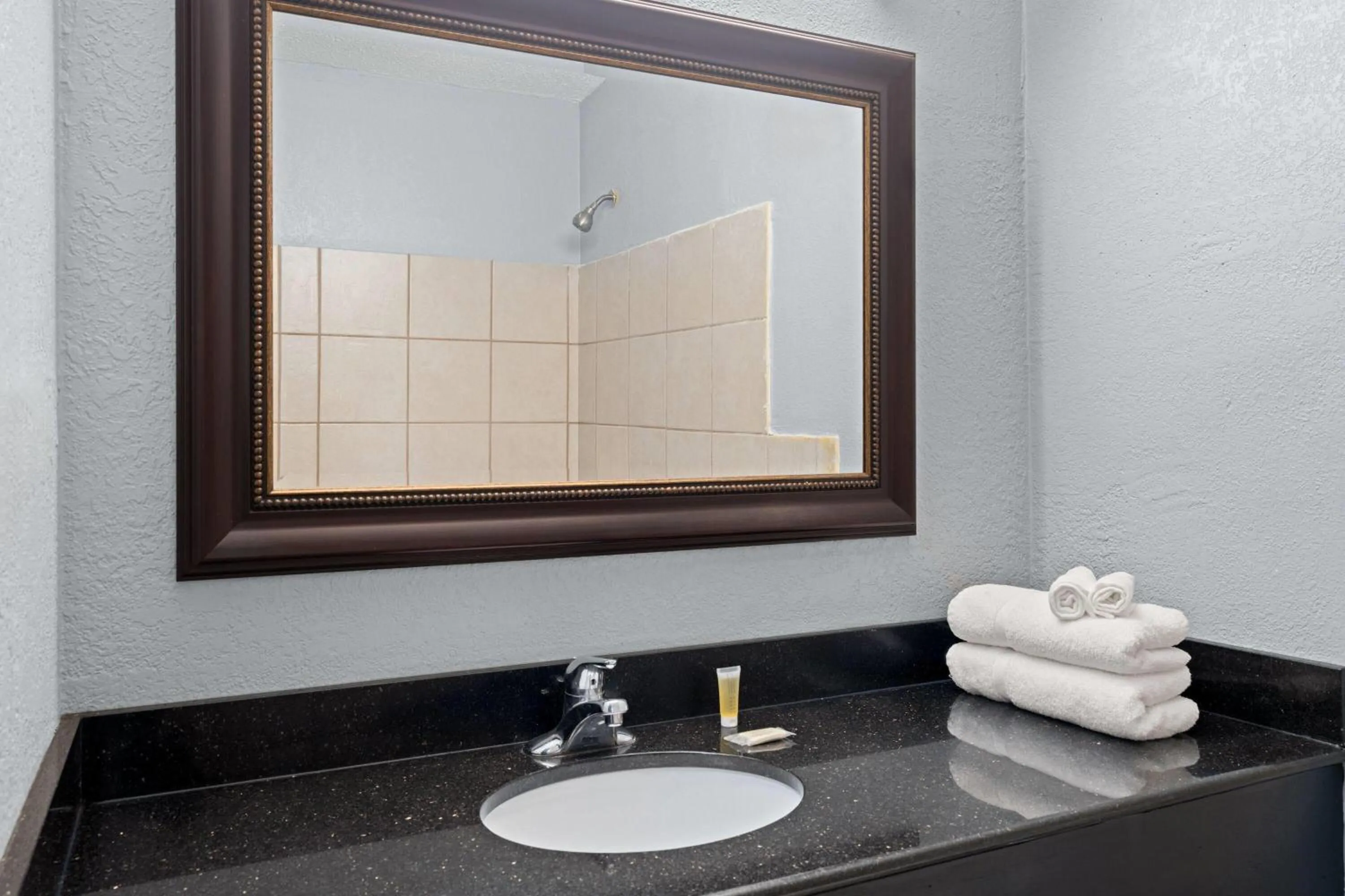 Bathroom in Super 8 by Wyndham Fort Wayne