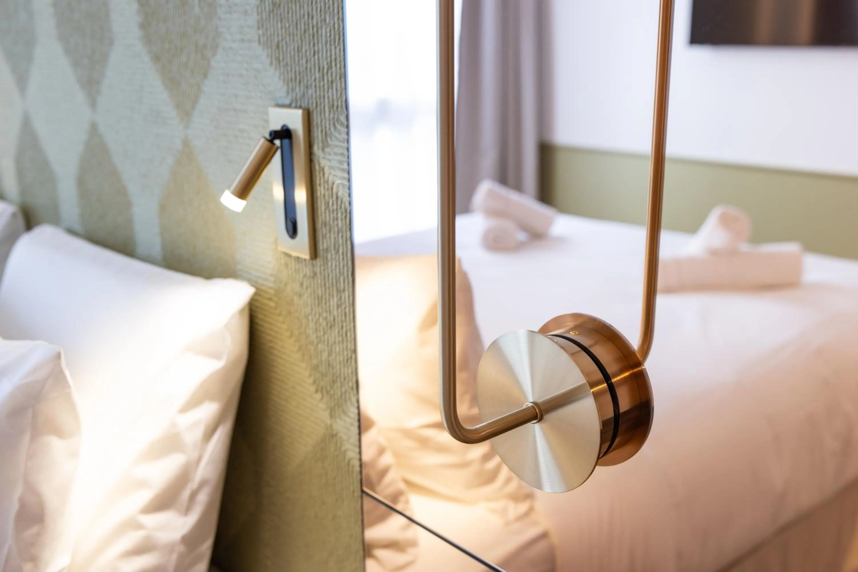 Bed in Hôtel Kyriad Prestige Paris Asnieres