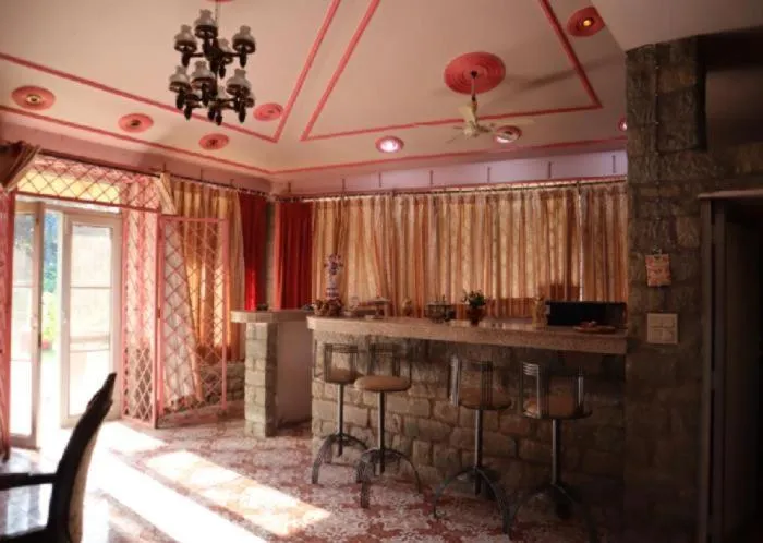 Living room in PRITHVI FARM COTTAGE AND VILLA