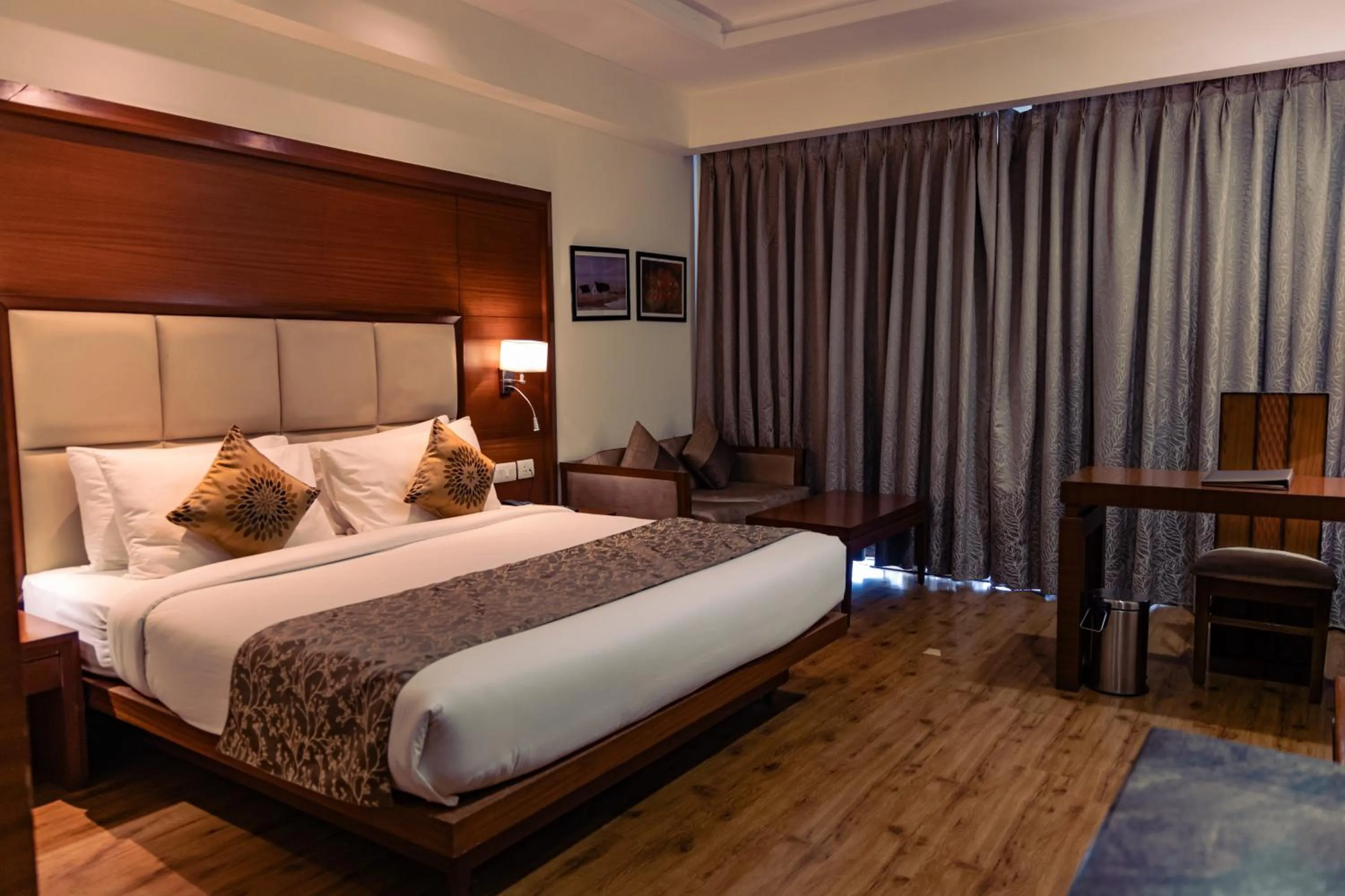 Bedroom, Bed in The Nikunj Hotels