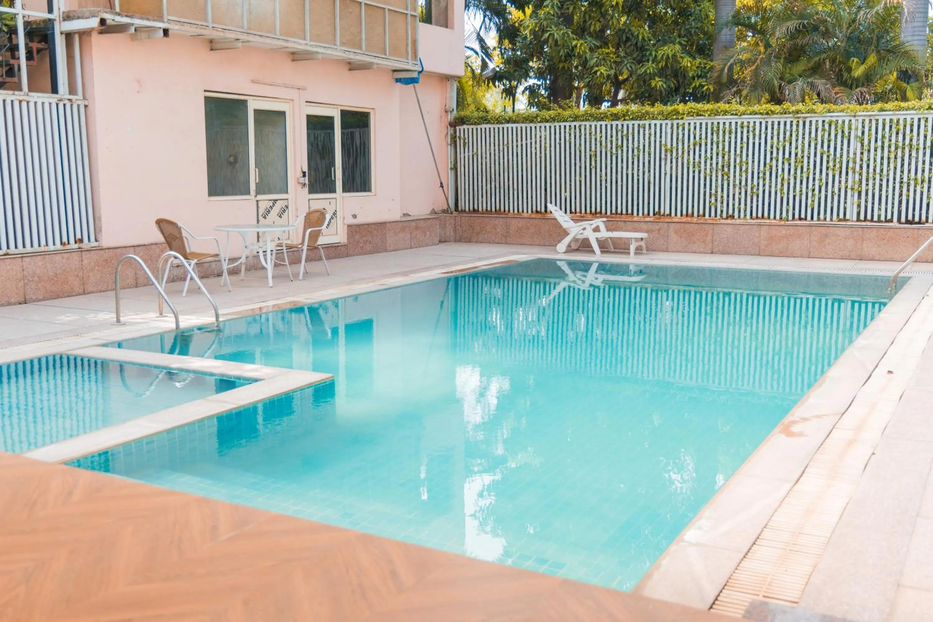 Swimming pool in The Nikunj Hotels
