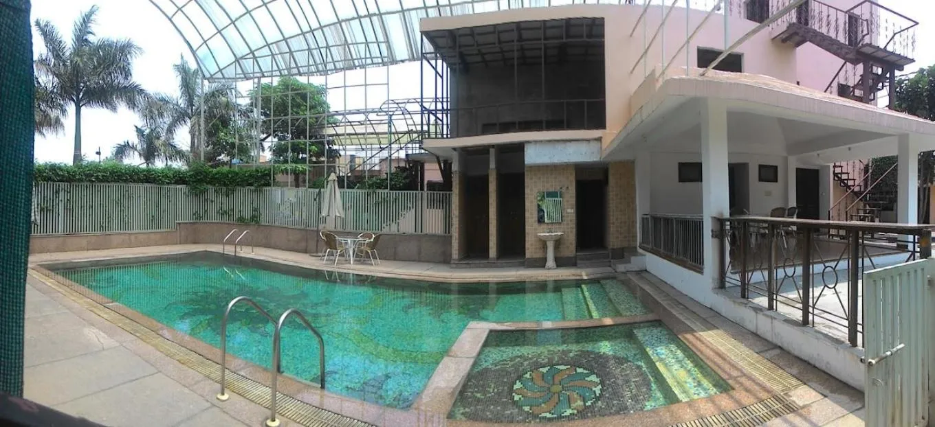 Swimming pool in The Nikunj Hotels