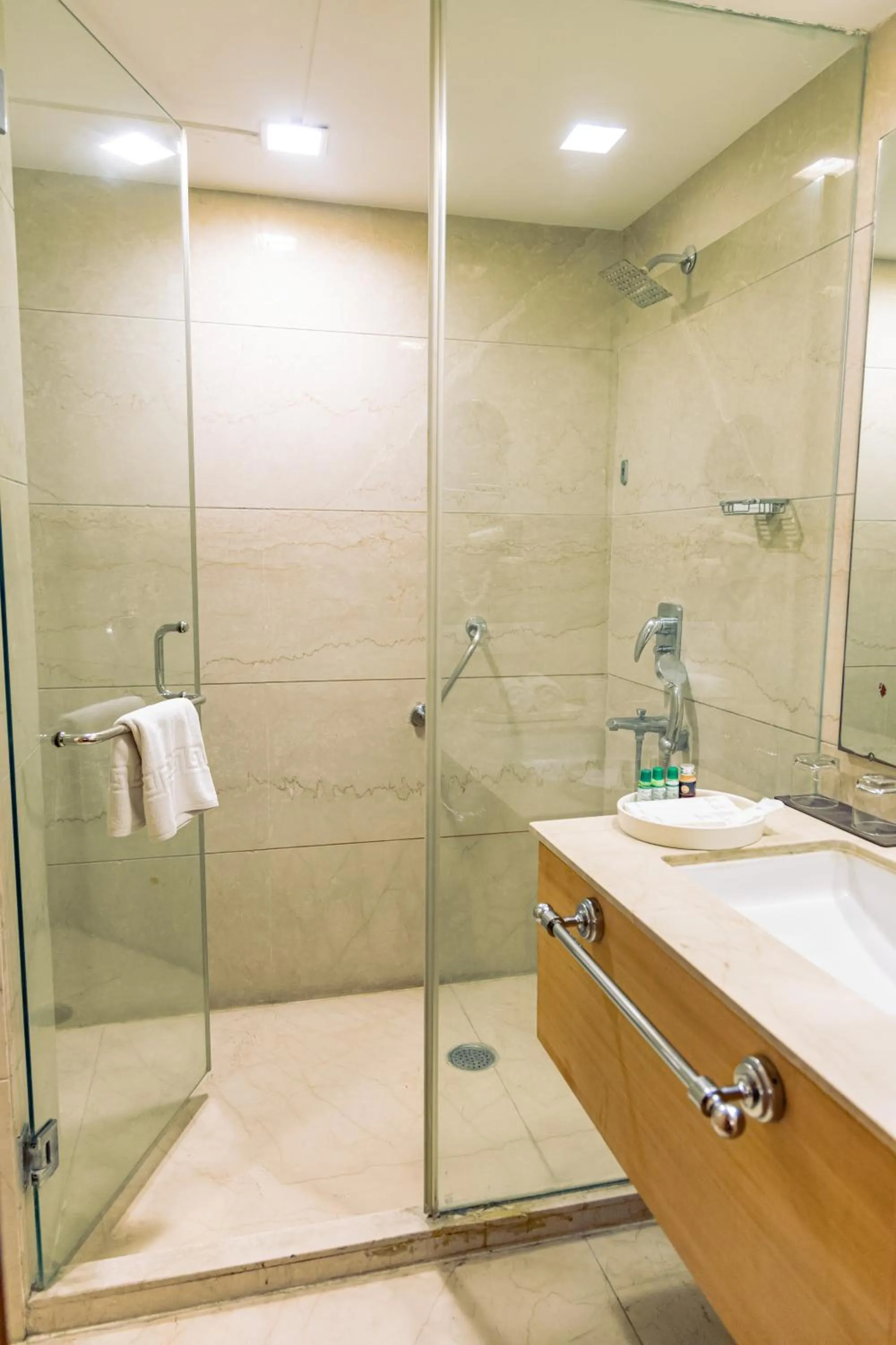 Shower in The Nikunj Hotels