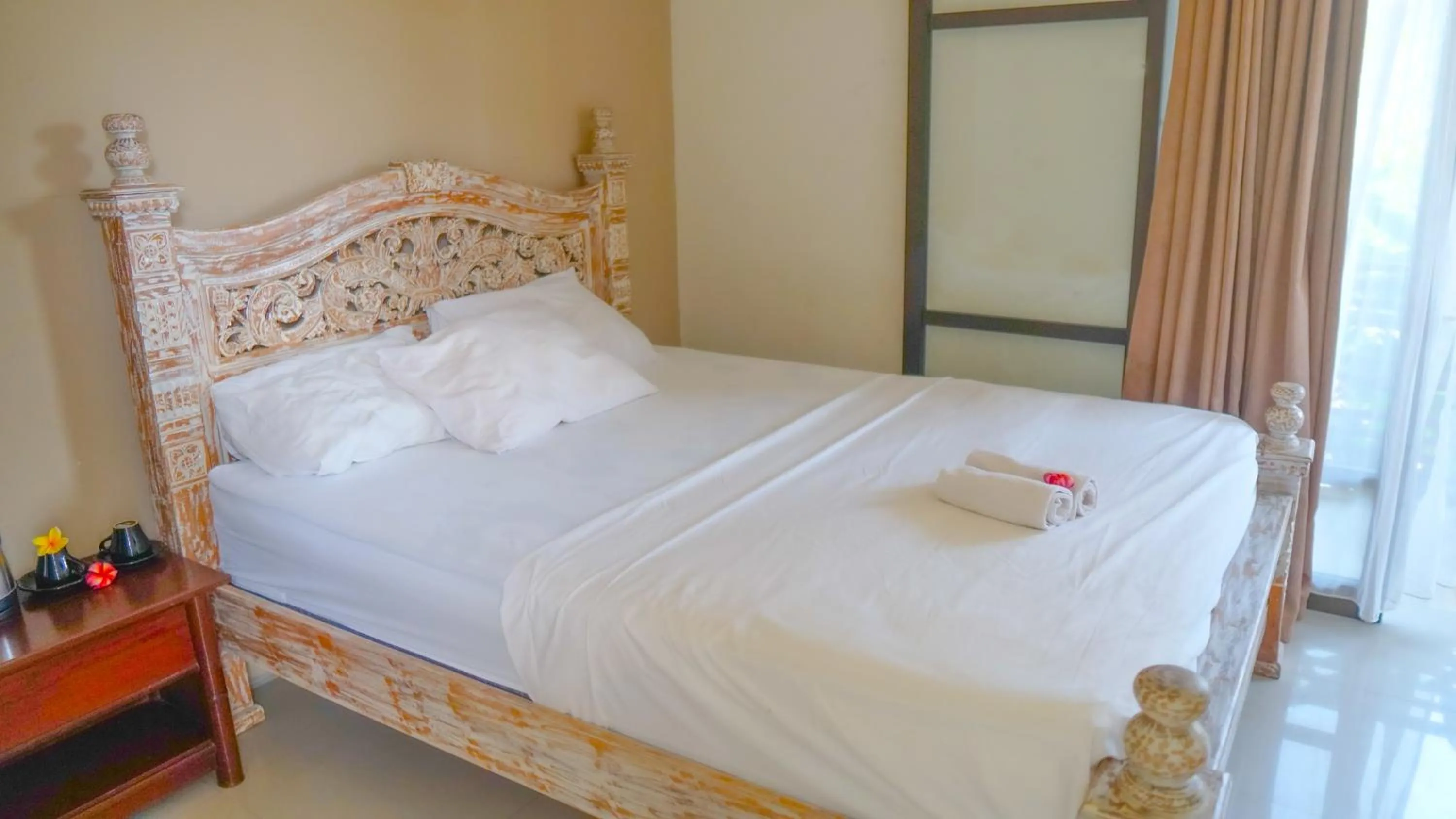 Bed in Dirga's House Sanur View by EPS