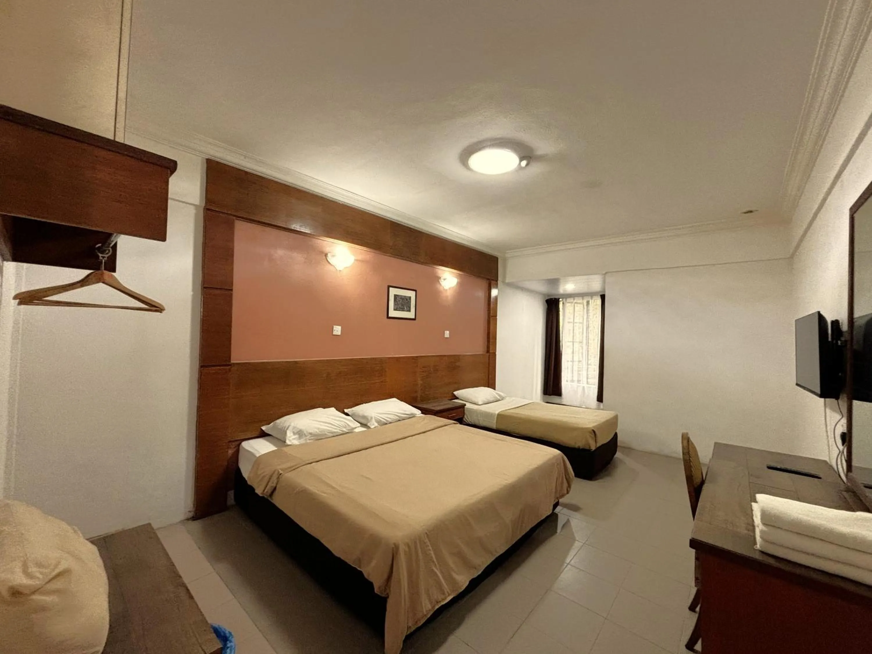 Bed in Cool Point Hotel