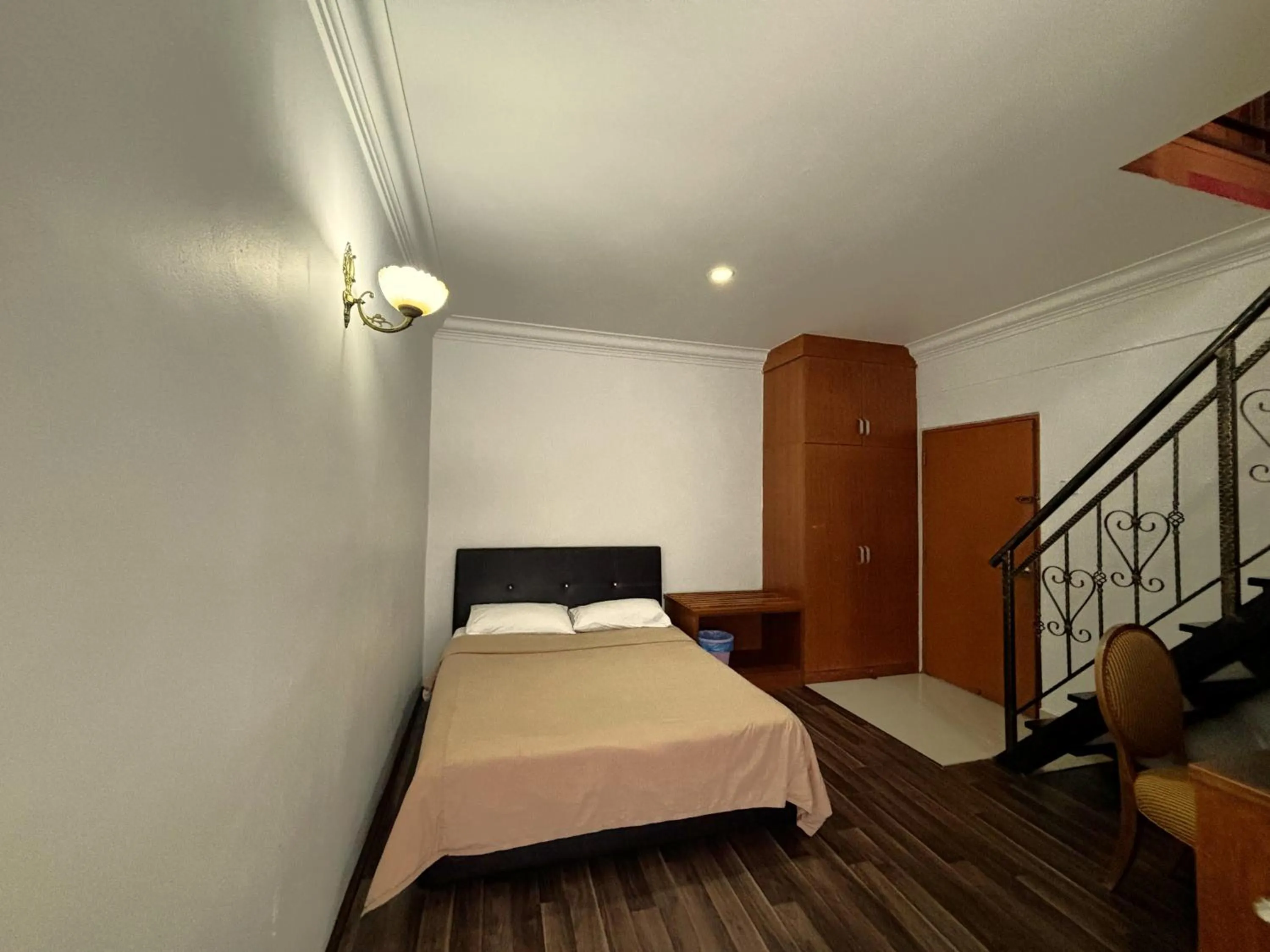 Bed in Cool Point Hotel