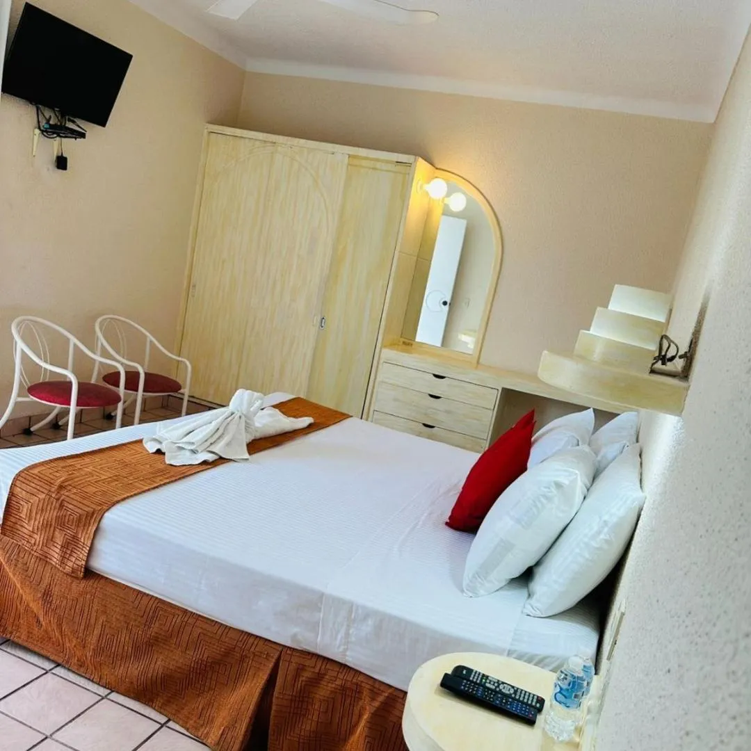 Bed in Hotel Hacienda del Rio Oaxtepec