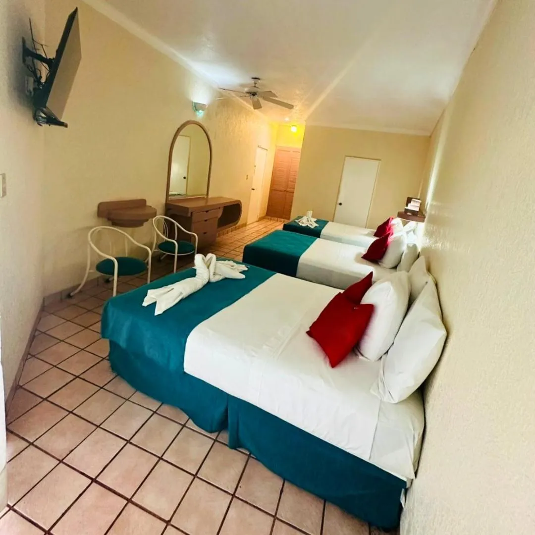 Bed in Hotel Hacienda del Rio Oaxtepec