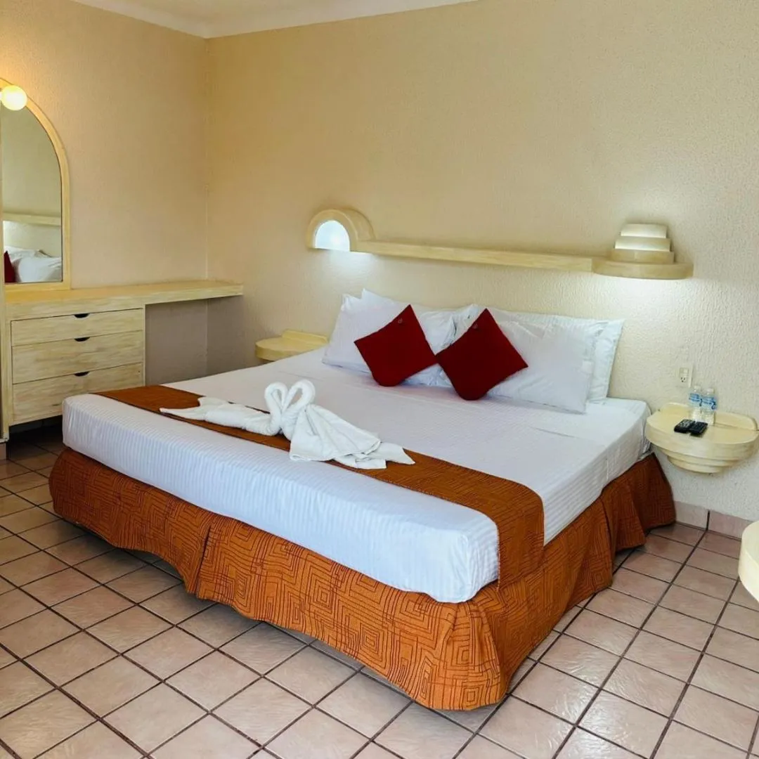 Bed in Hotel Hacienda del Rio Oaxtepec