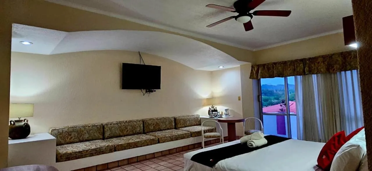 Bed in Hotel Hacienda del Rio Oaxtepec