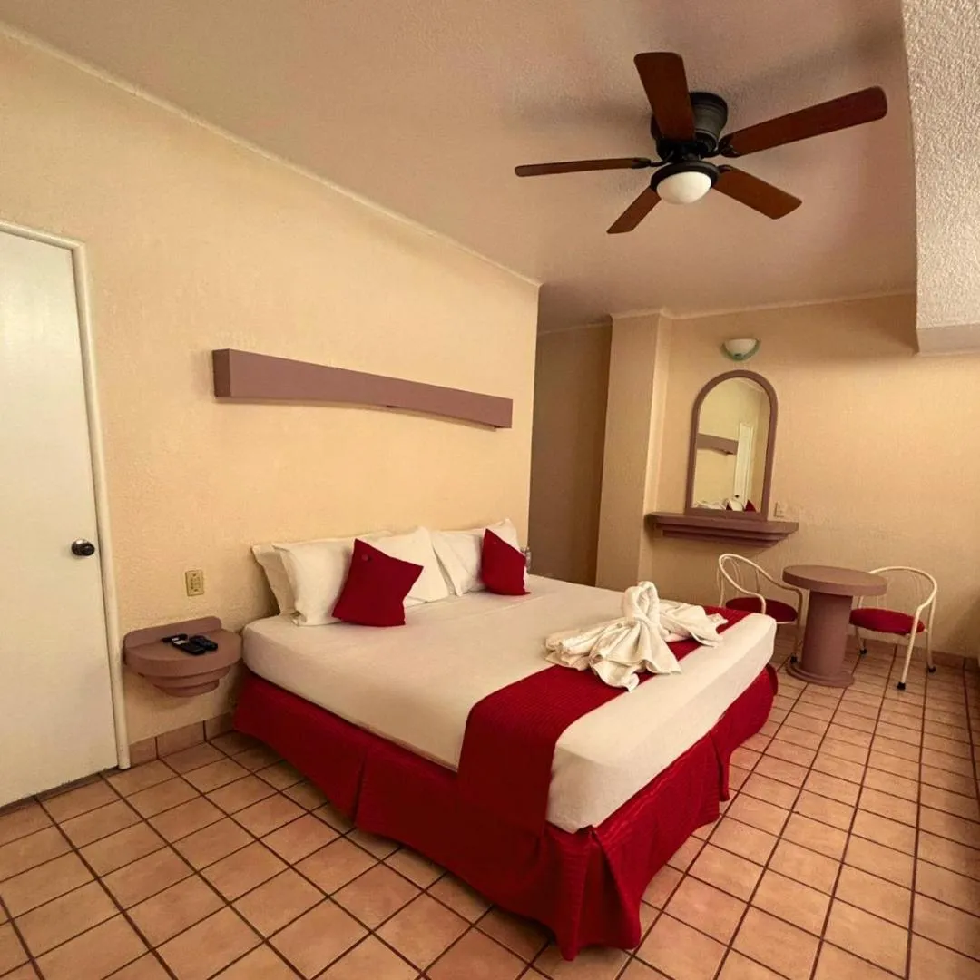 Bed in Hotel Hacienda del Rio Oaxtepec