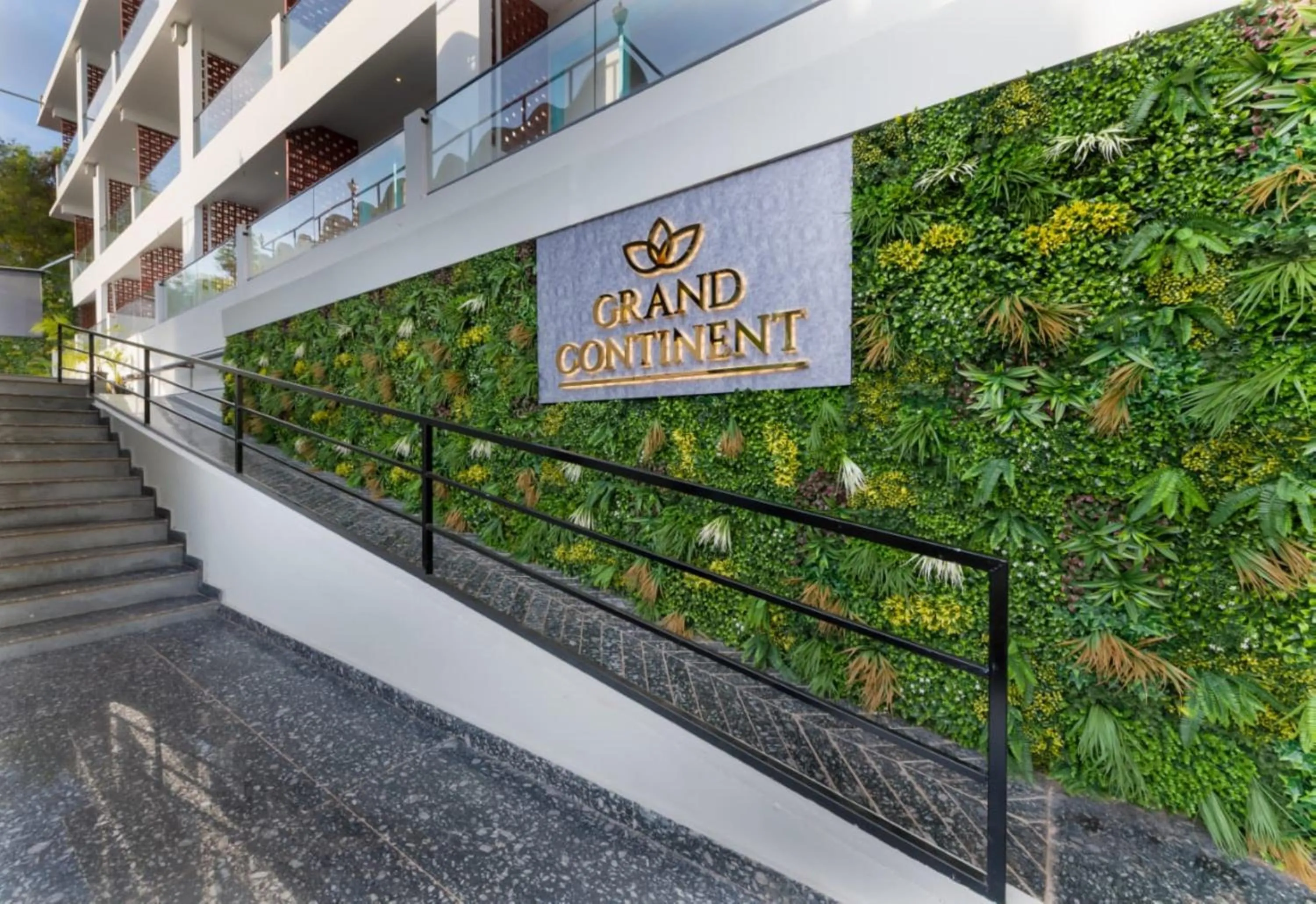 Property logo or sign in Grand Continent Morjim