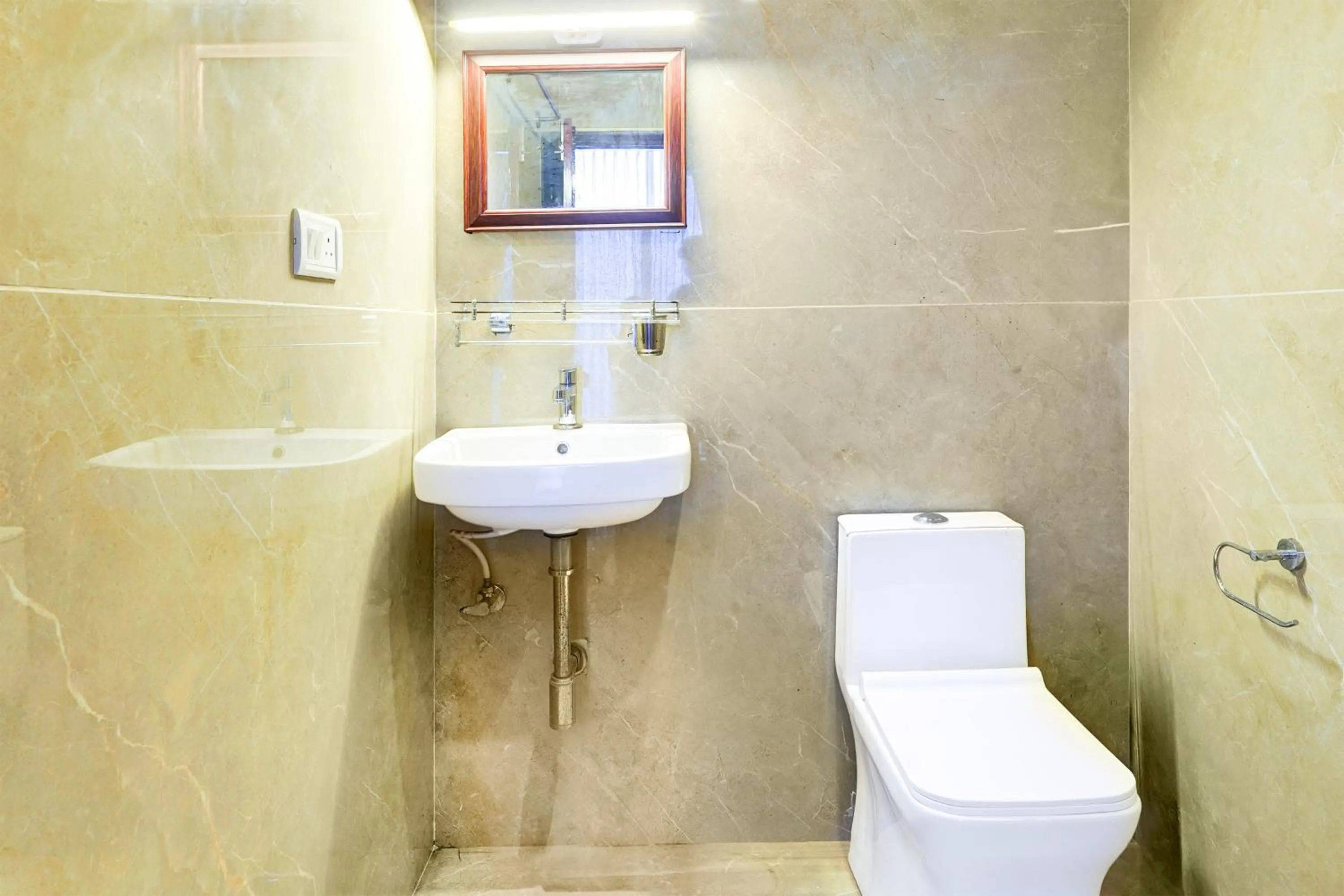 Bathroom in Super Townhouse NK Vivanta Luxury Rooms