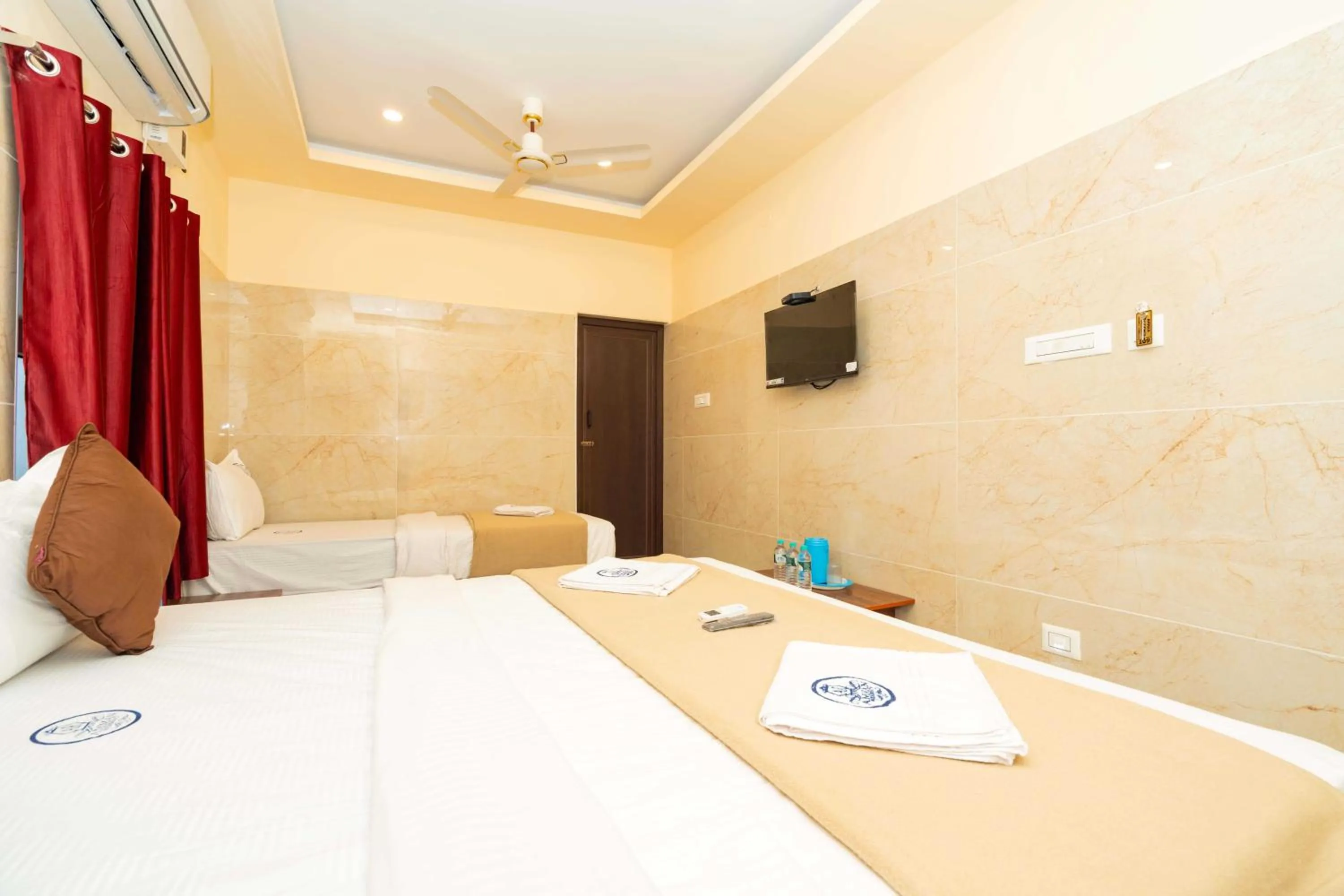 Photo of the whole room, Bed in Amman Residency - Rameswaram