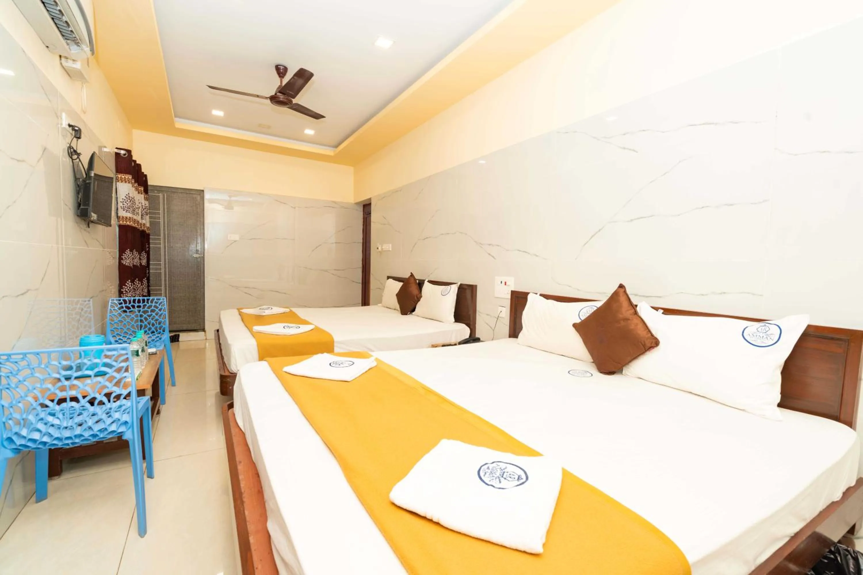 Photo of the whole room, Bed in Amman Residency - Rameswaram