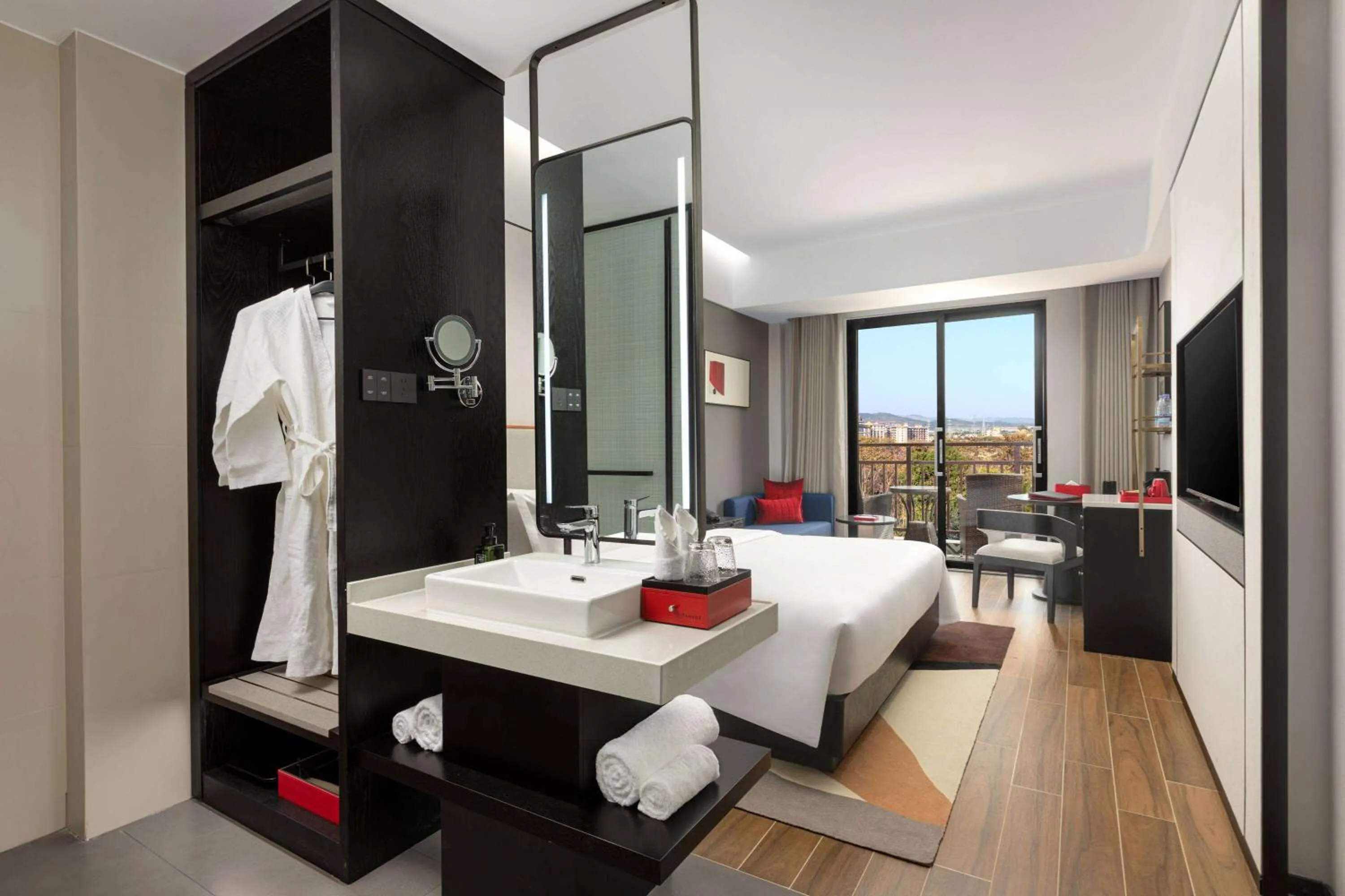 Photo of the whole room, Bed in Ramada by Wyndham Xishuangbanna Jinghong