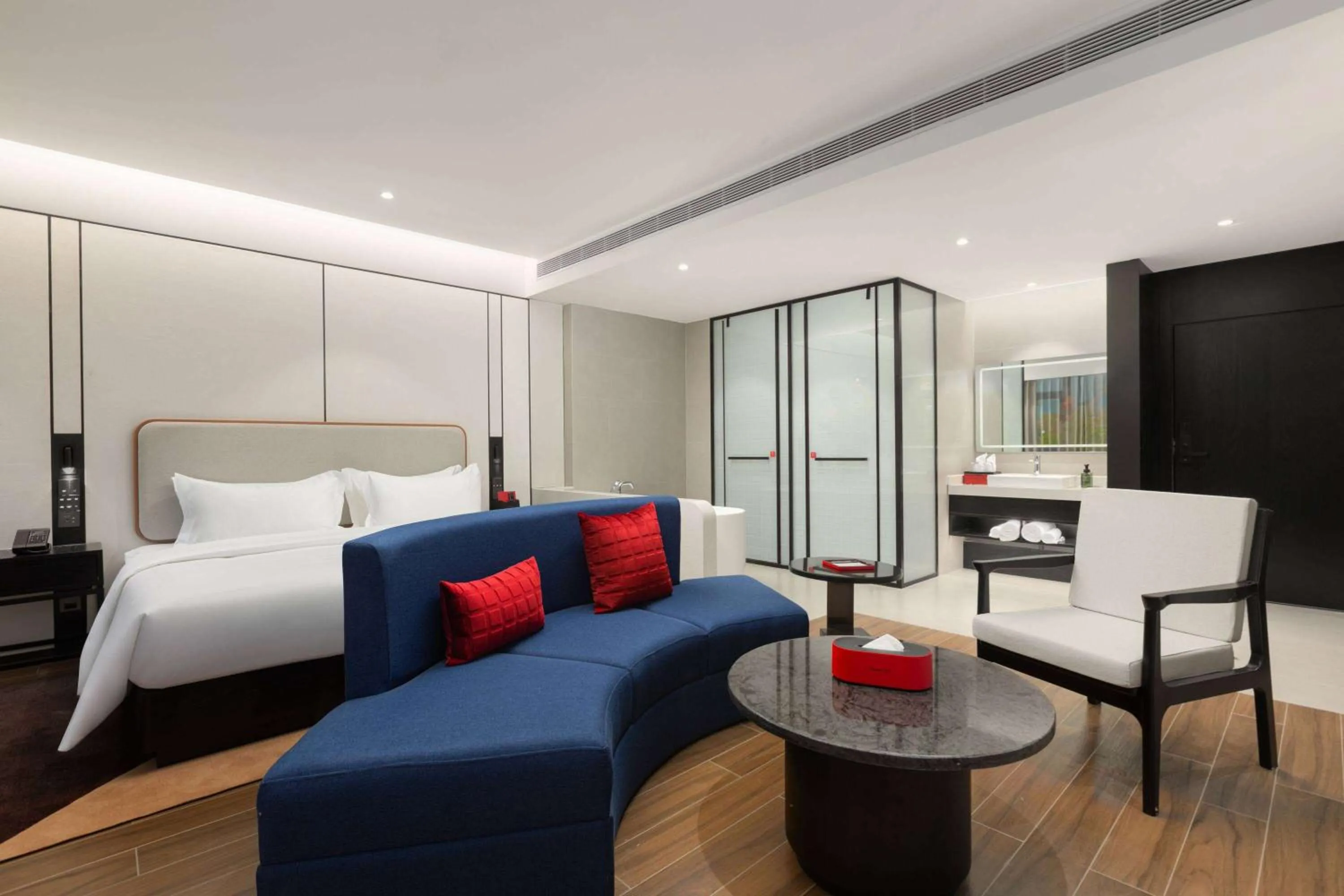 Photo of the whole room, Bed in Ramada by Wyndham Xishuangbanna Jinghong